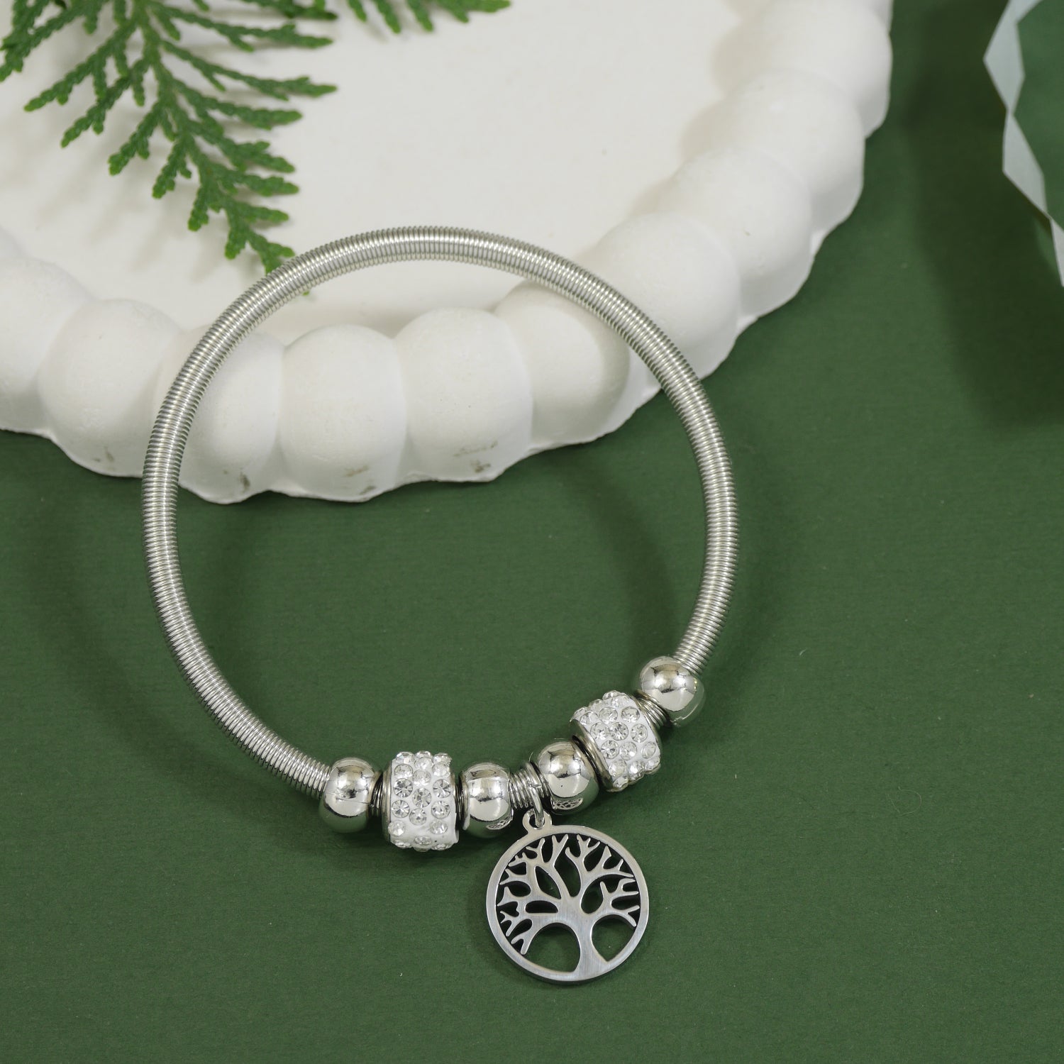 Silver charm bracelet with Tree of Life pendant and rhinestone-studded beads