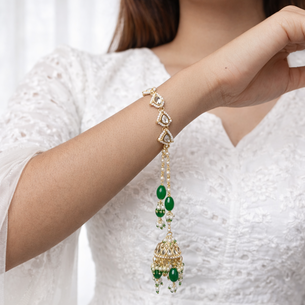 Gurleen- Kundan Pearl Jhumki Tassel Bracelet with Emerald Green Beads