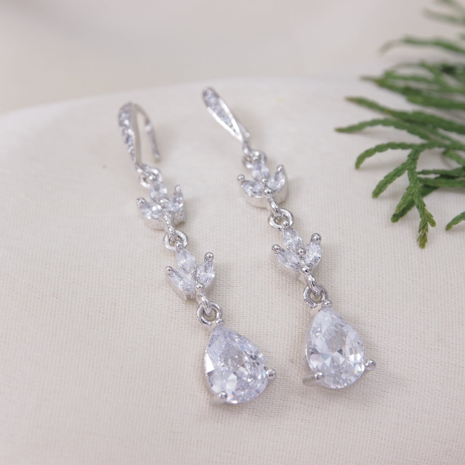 Silver shine plated earrings, elegant women’s fashion accessory.