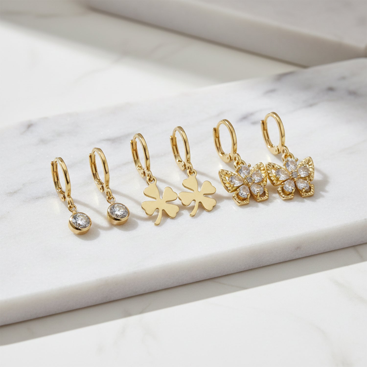 Lucy- Stylish Drop Earrings Featuring Solitaire, Clover, and Butterfly