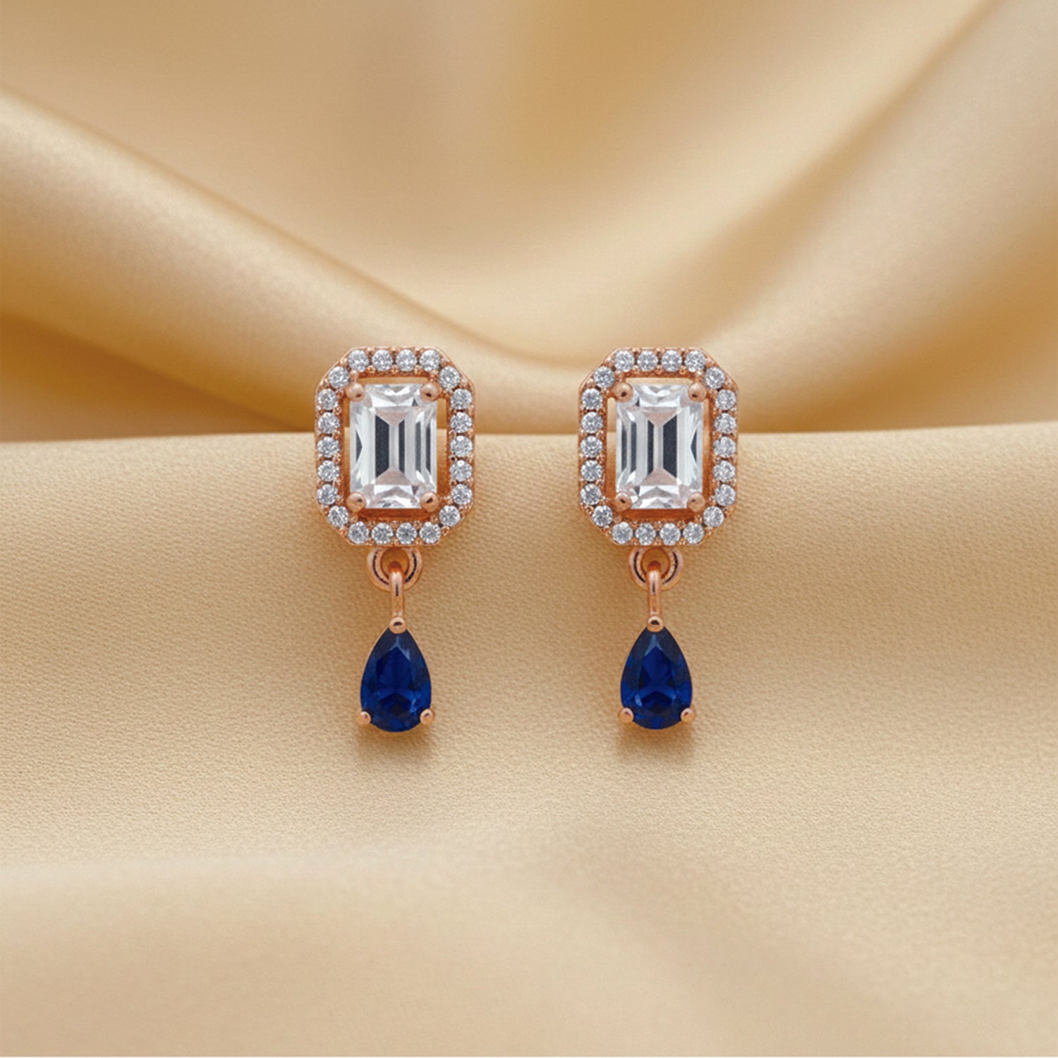 Clare- Blue Teardrop Stud Earrings in Rose Gold Finish