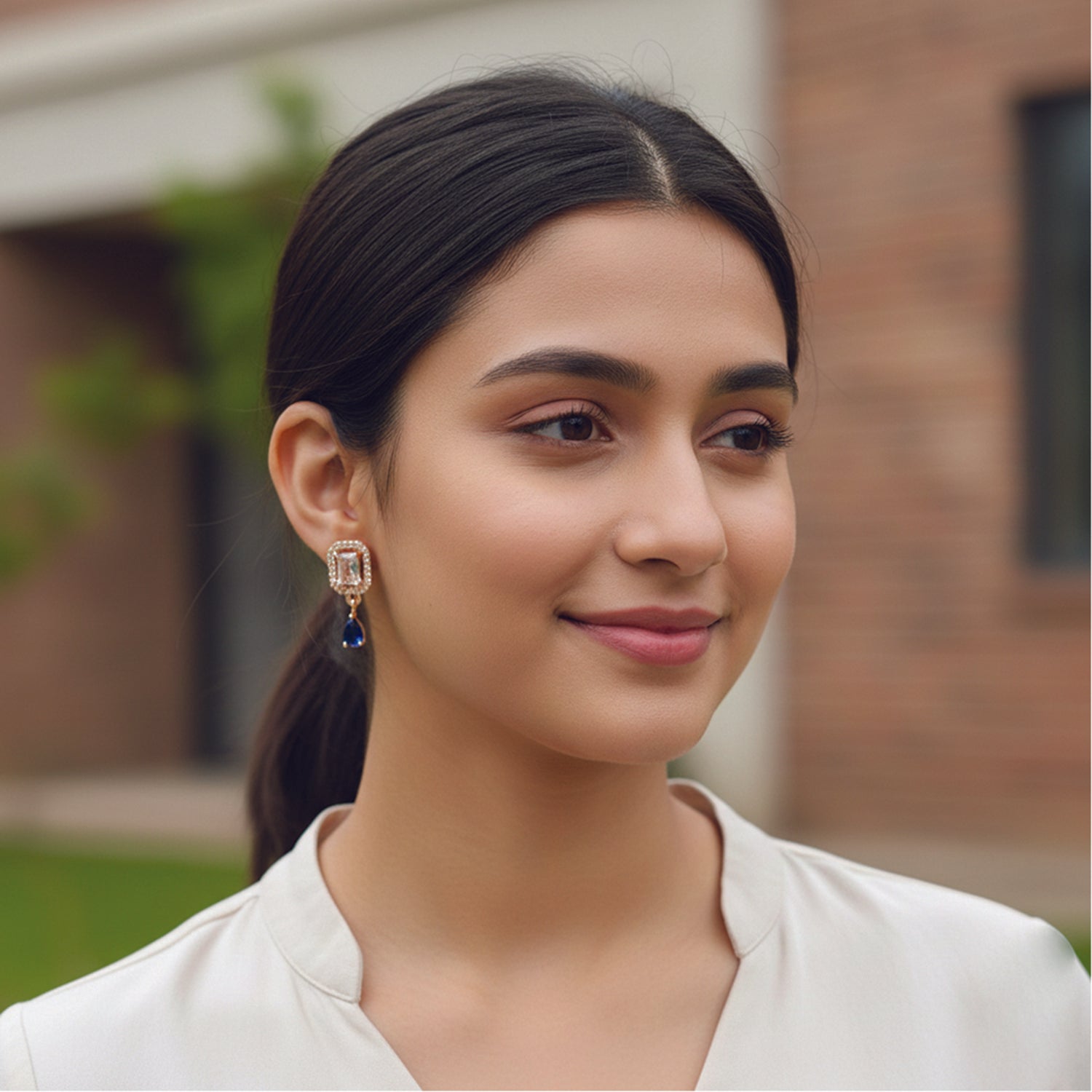 Clare- Blue Teardrop Stud Earrings in Rose Gold Finish