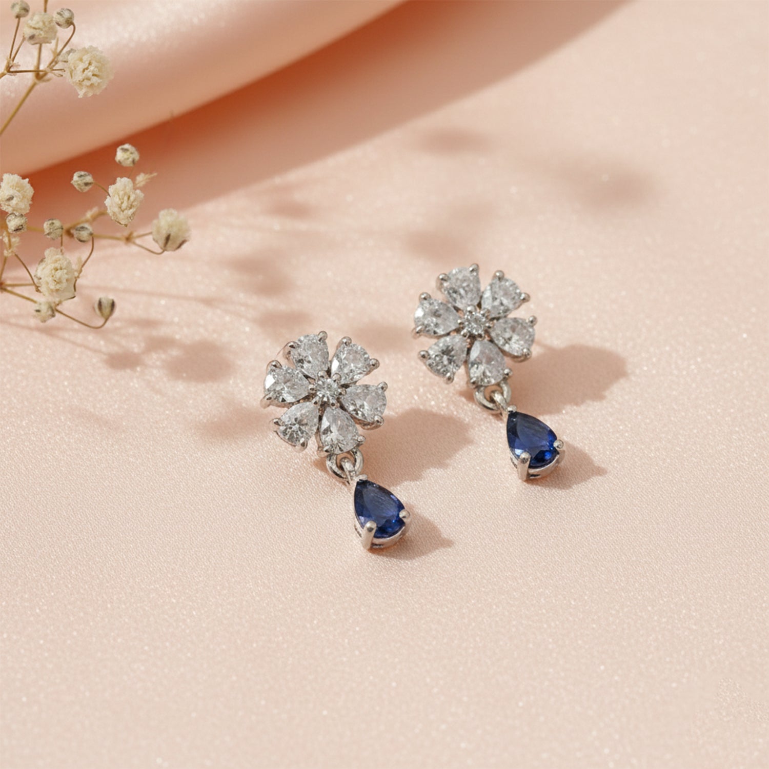 Elara- Blue Teardrop Floral Stud Earrings in Silver Finish