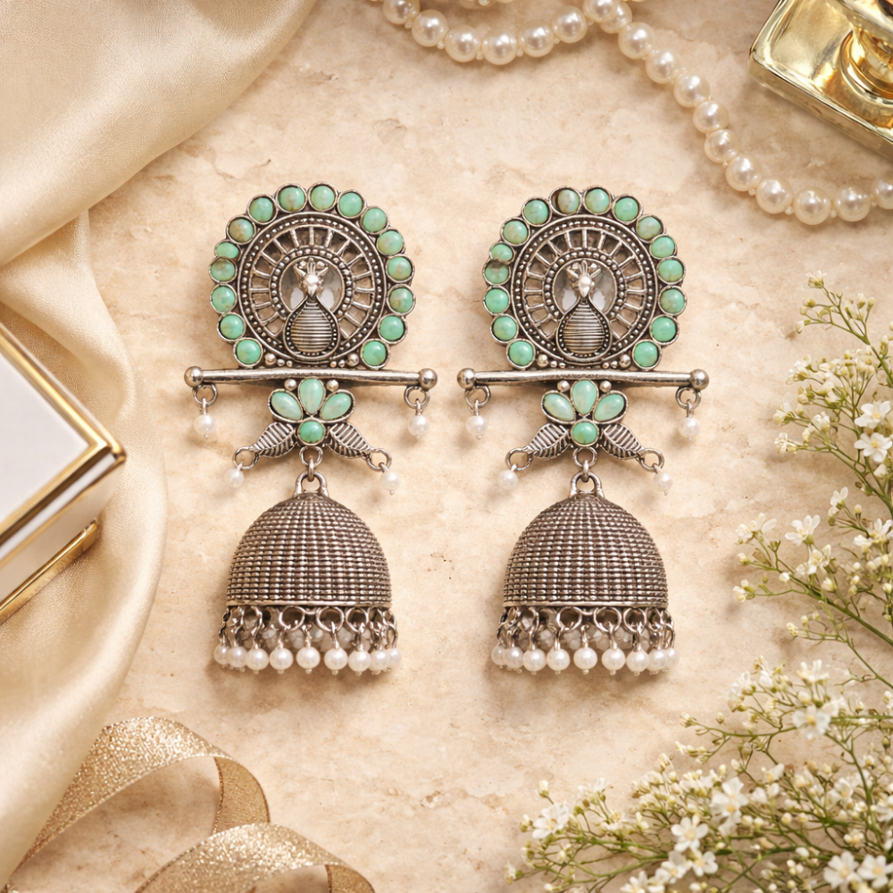 Antra- Oxidised Peacock Jhumka Earrings with Mint Stone