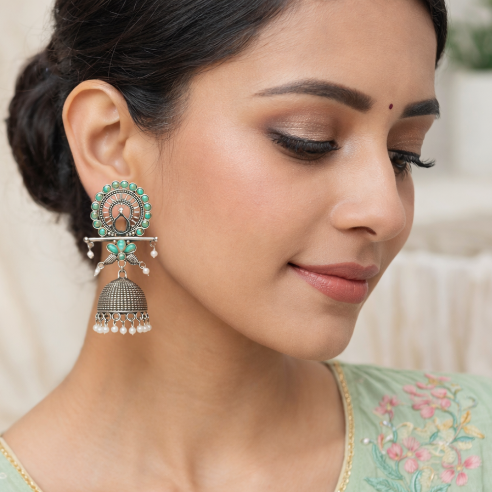 Antra- Oxidised Peacock Jhumka Earrings with Mint Stone