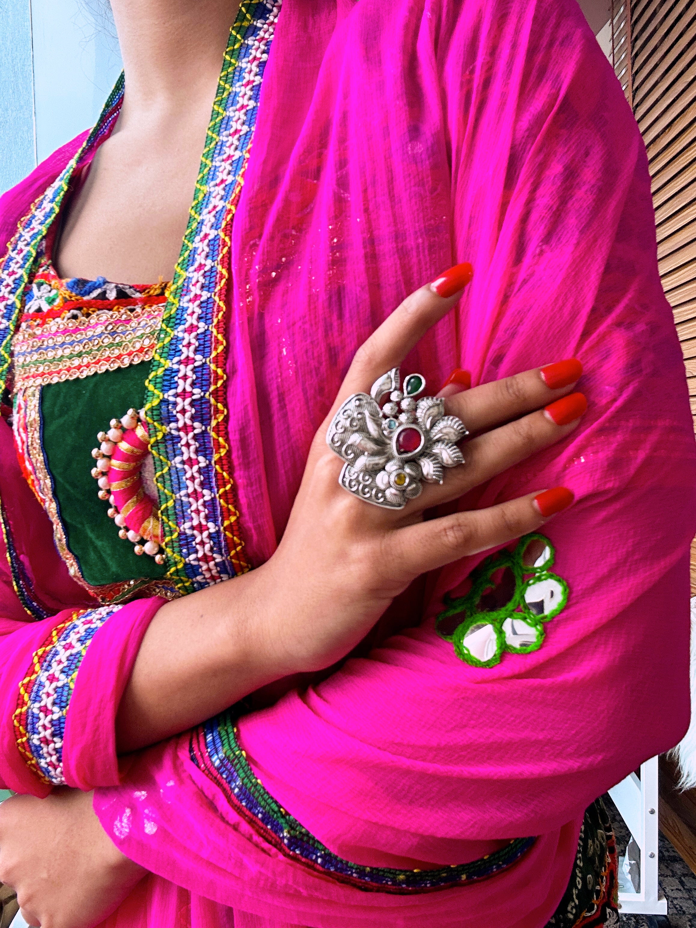 Oxidised peacock motif kada ring with red and green stones for women’s Navratri wear