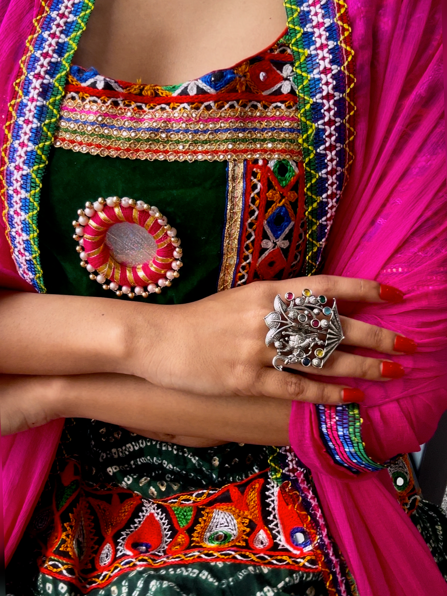 Oxidised kada ring with carved detailing and colorful stones for women’s festive style
