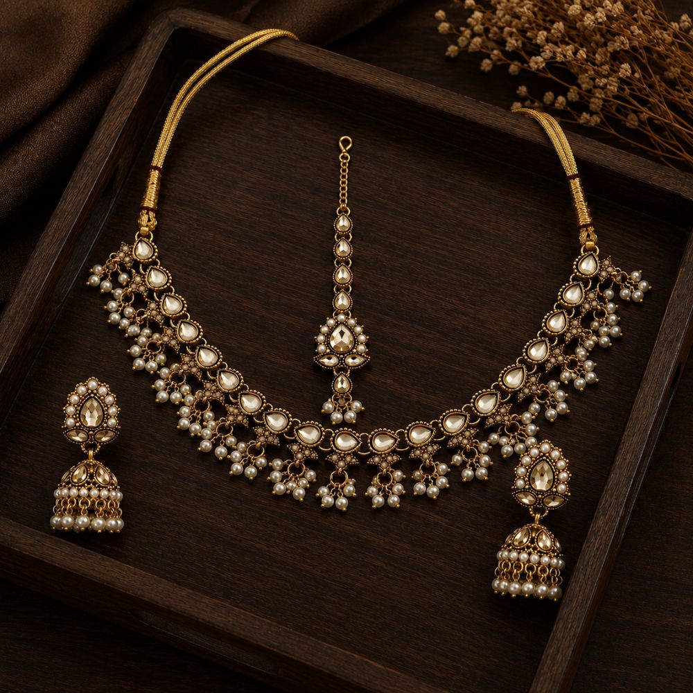 Ishvani -Pearl Kundan Jhumka Necklace Set with Earrings & Maang Tikka