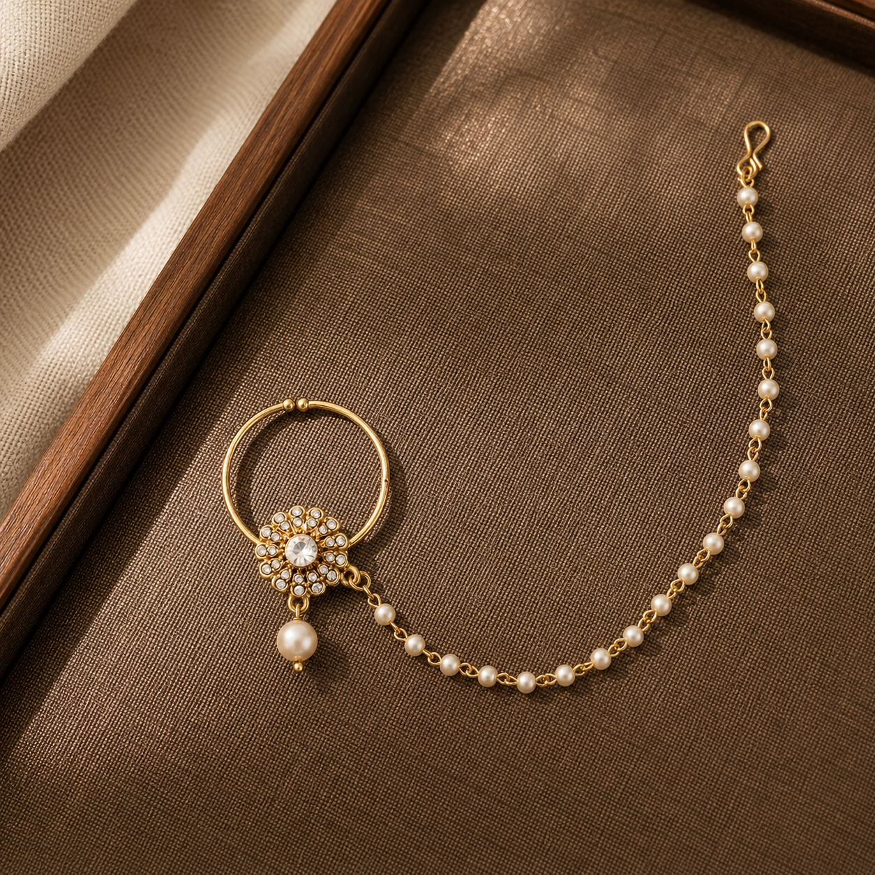 Gold-Plated White Flower Kundan-Studded Nose Ring With Pearl Chain