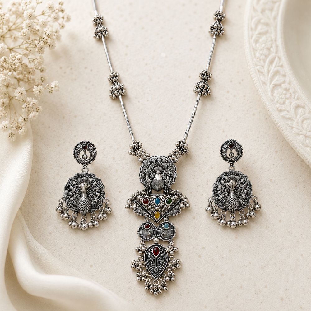 Dhanvika - Oxidised Silver Peacock Pendant Necklace Set