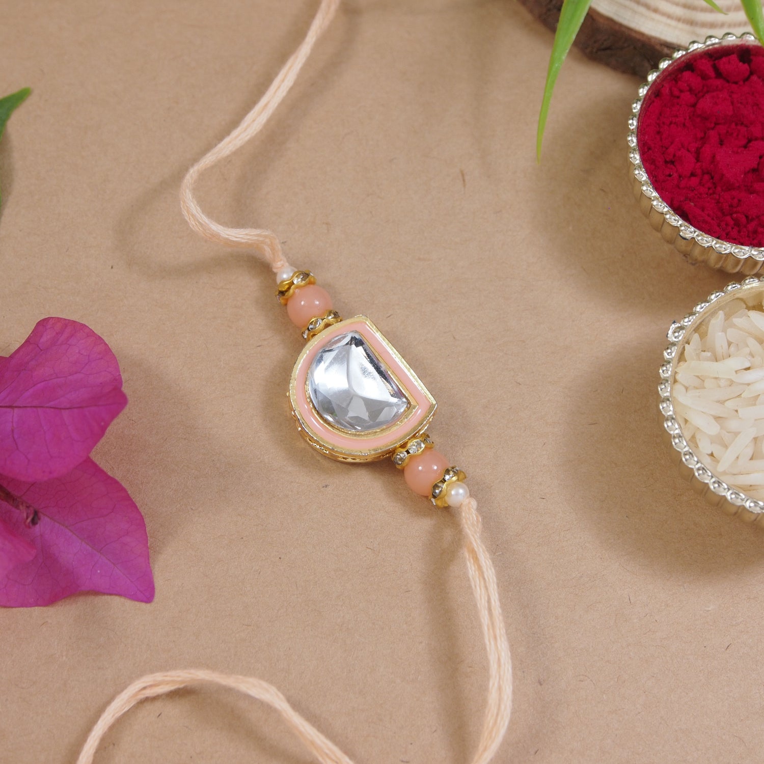 Dazzling Pearl Kundan Stone Rakhi with Roli Chawal & Card