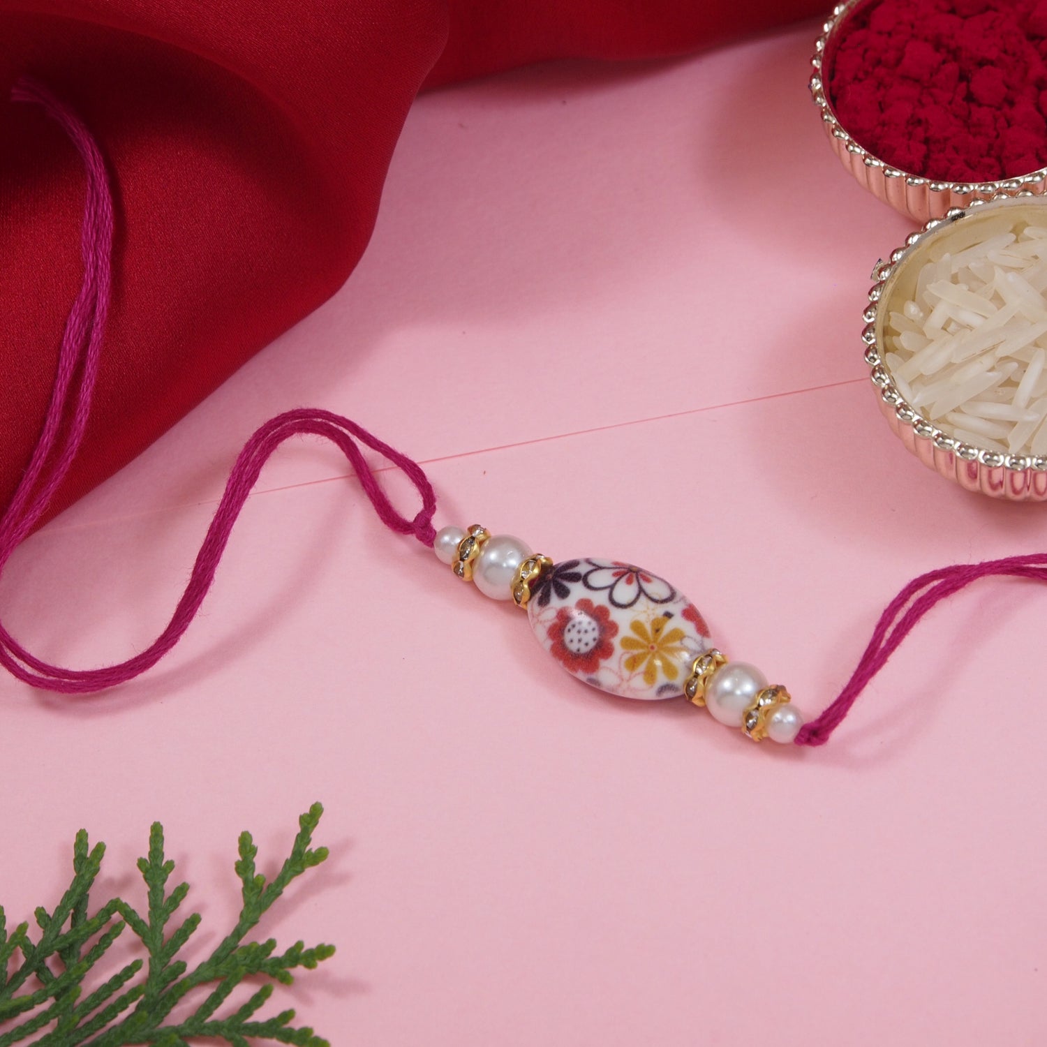 Delicate Pearl Beads Pink Rakhi with Roli Chawal & Rakshabandhan Card