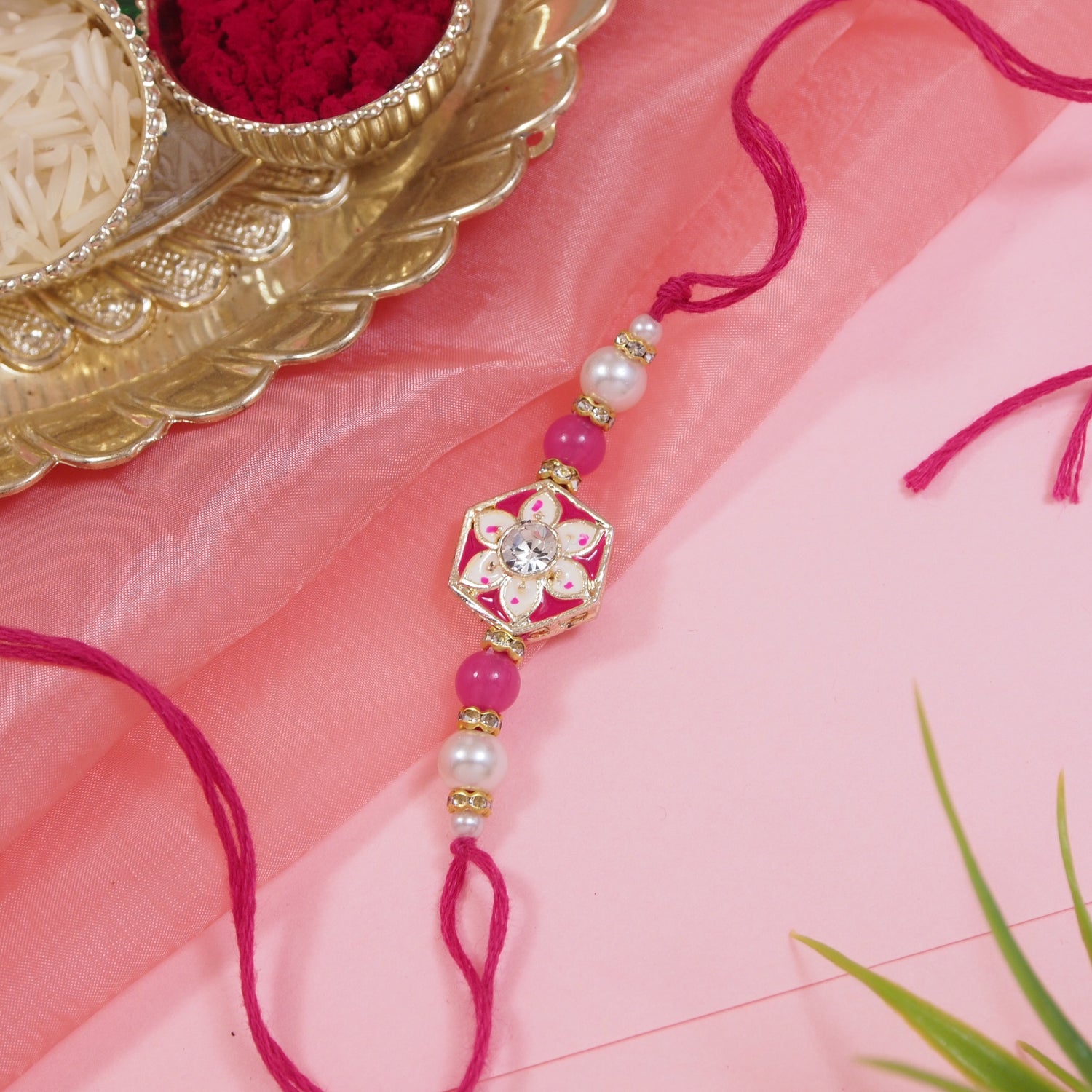 Delicate Pearl Beads Pink Rakhi with Roli Chawal & Rakshabandhan Card