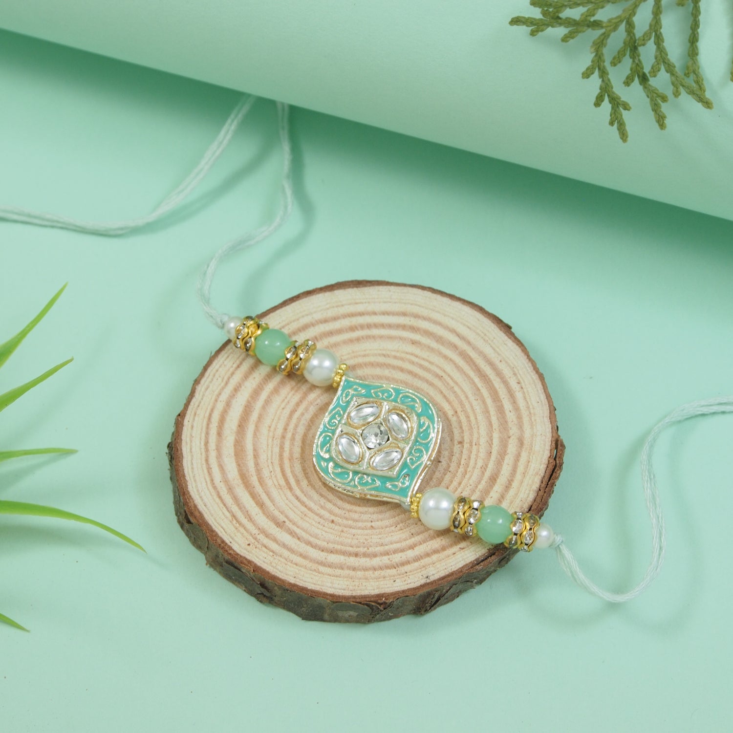 Delicate Pearl Beads Mint Rakhi with Roli Chawal & Rakshabandhan Card