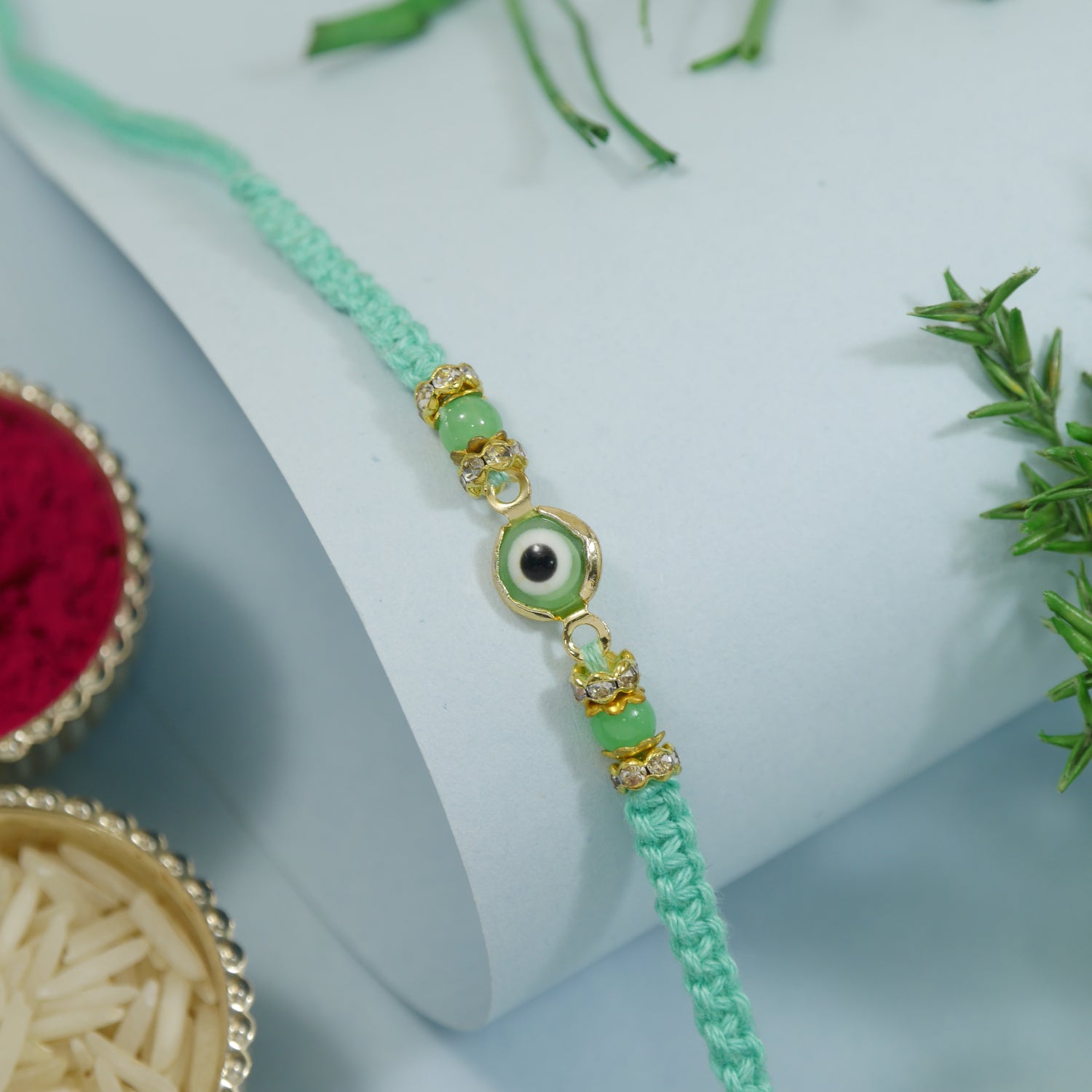 Delicate Mint Enamel Evil Eye Rakhi with Roli Chawal & Rakshabandhan Card