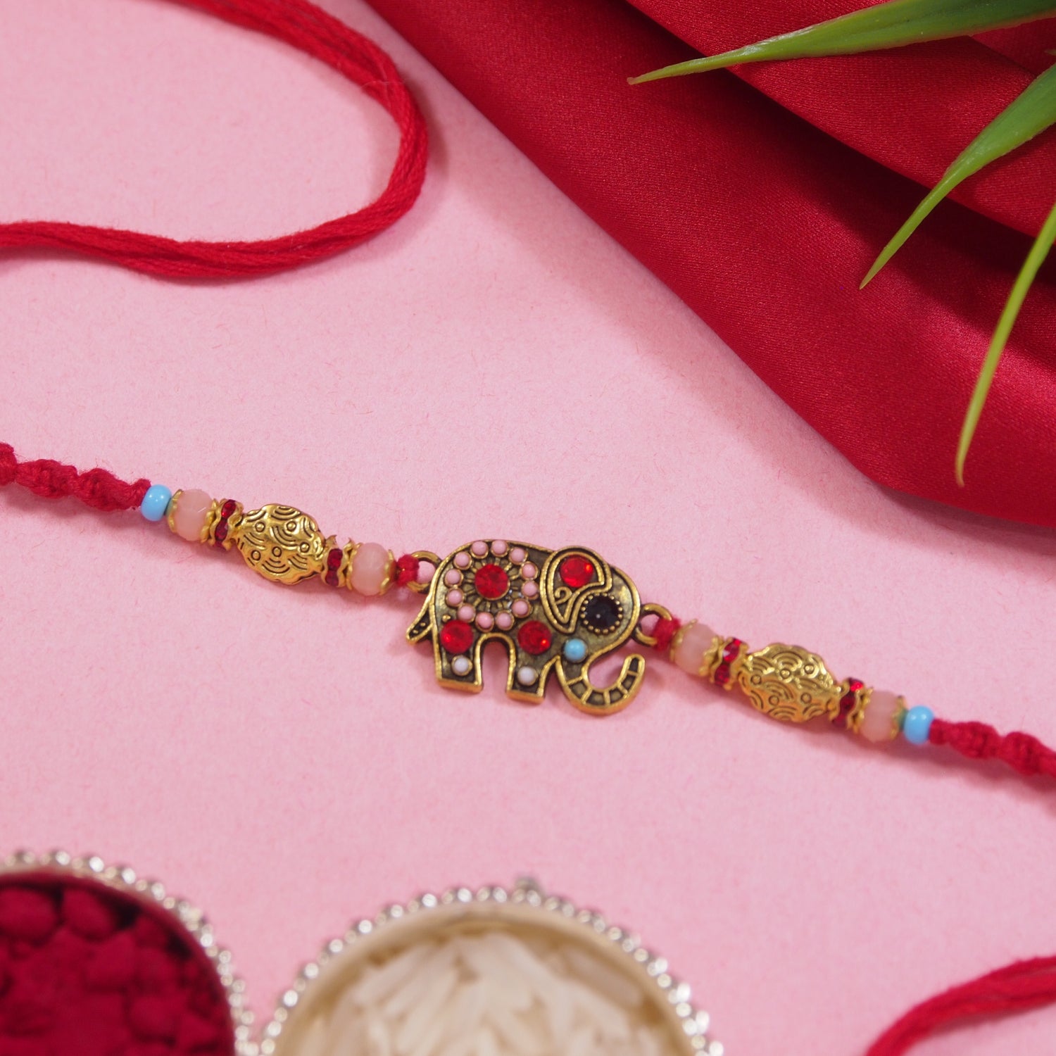 DELICATE PEARL BEADED Elephant RAKHI WITH ROLI CHAWAL & RAKSHABANDHAN CARD
