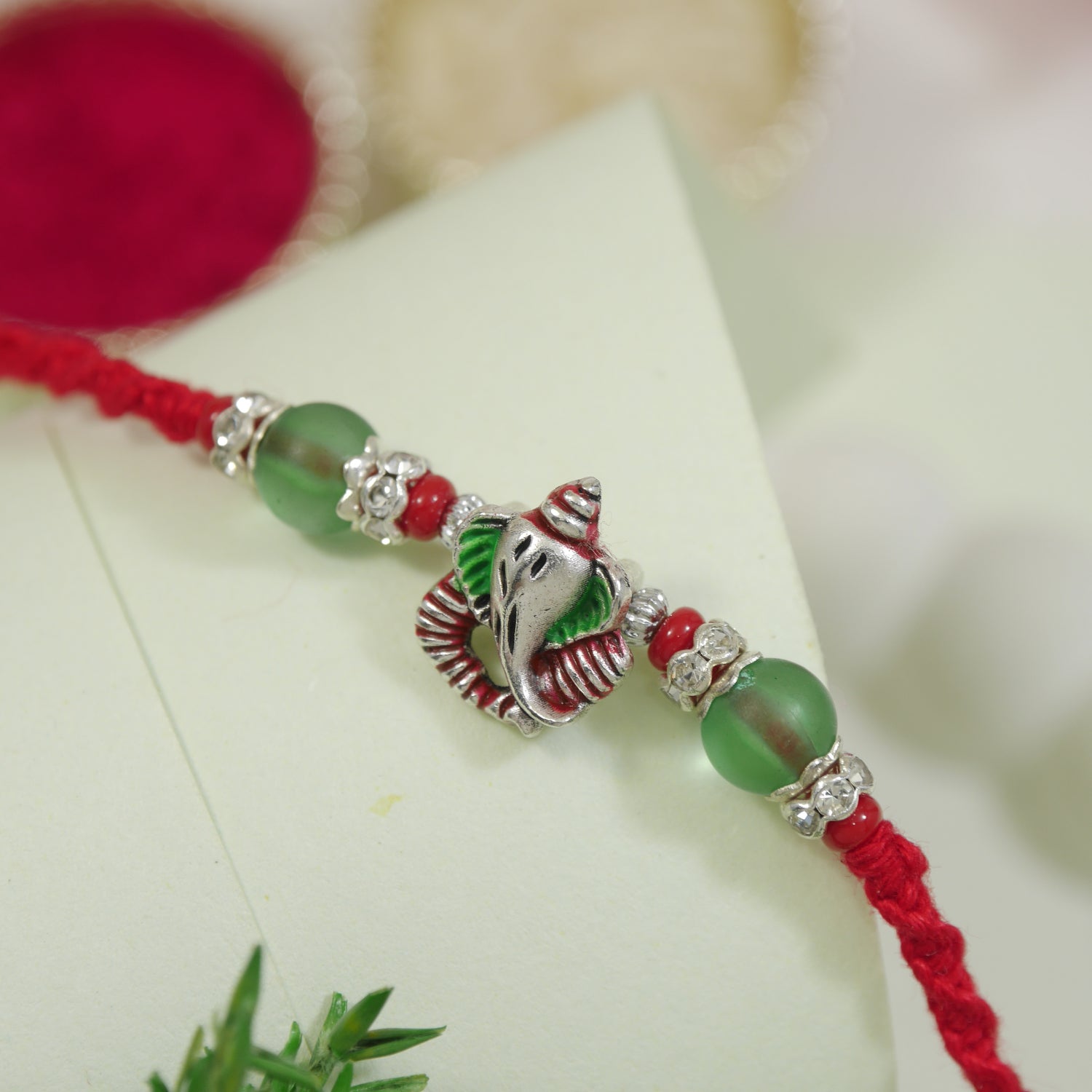 Divine Ganesha Rakhi With Roli Chawal & Rakshabandhan Card