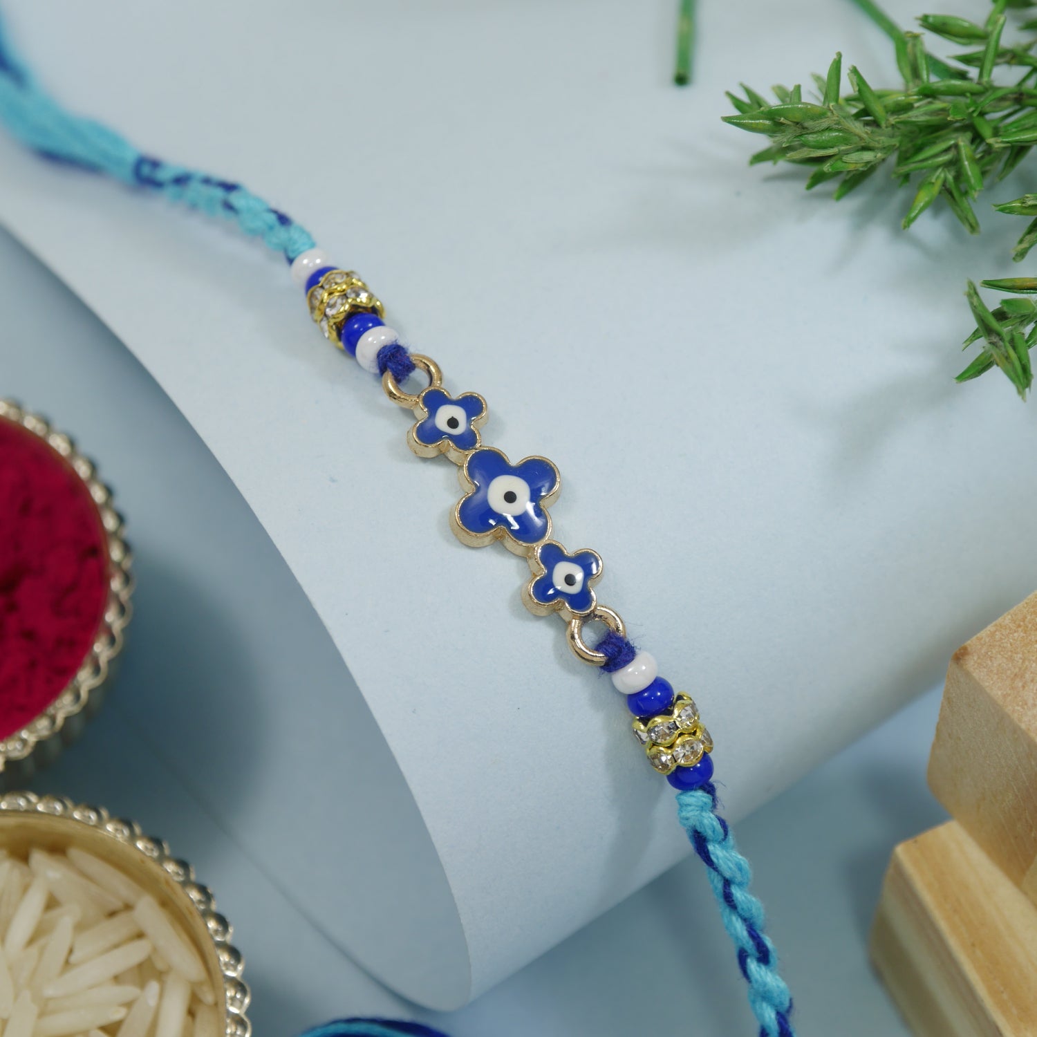 Chic Blue Enamel Evil Eye Rakhi with Roli Chawal & Rakshabandhan Card