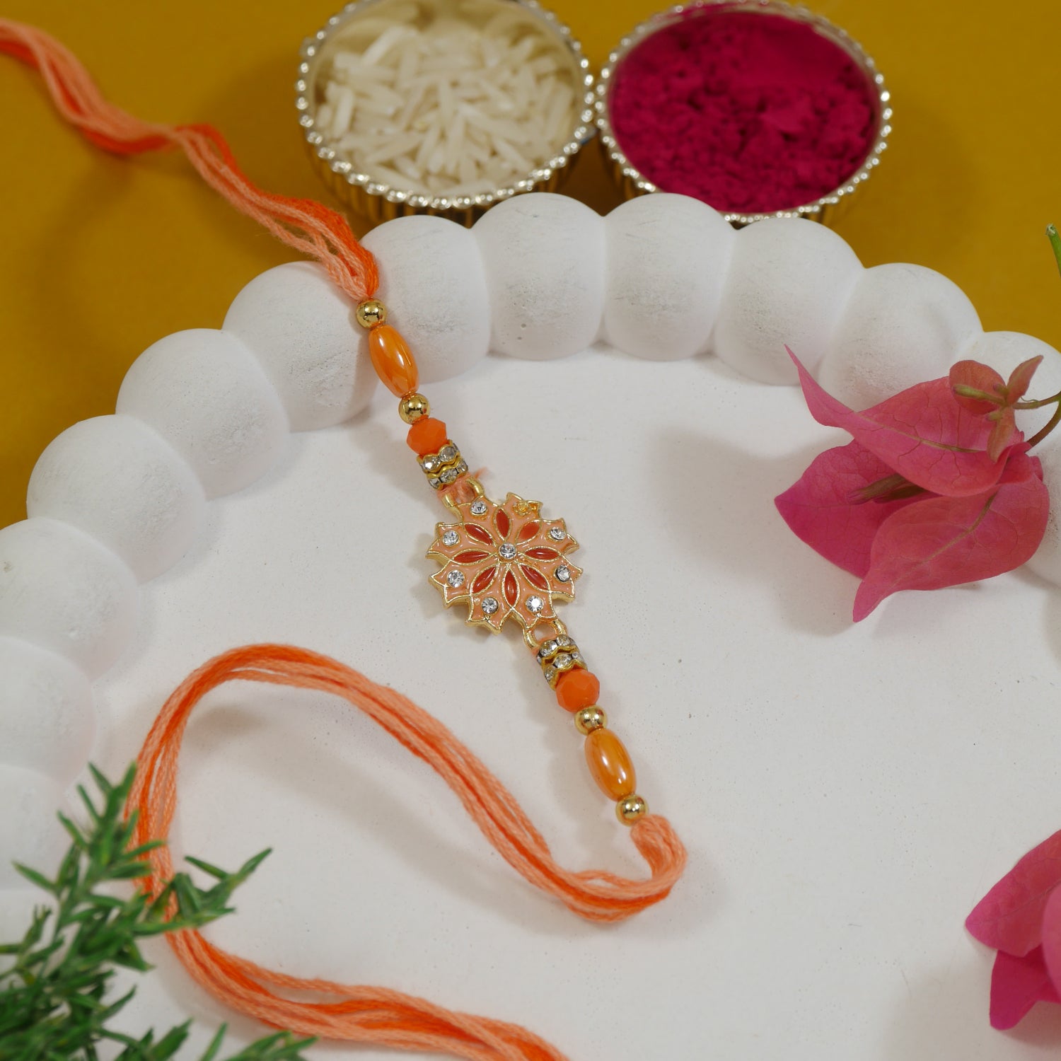 Elegant Orange Enamel Floral Rakhi with Roli Chawal & Rakshabandhan Card