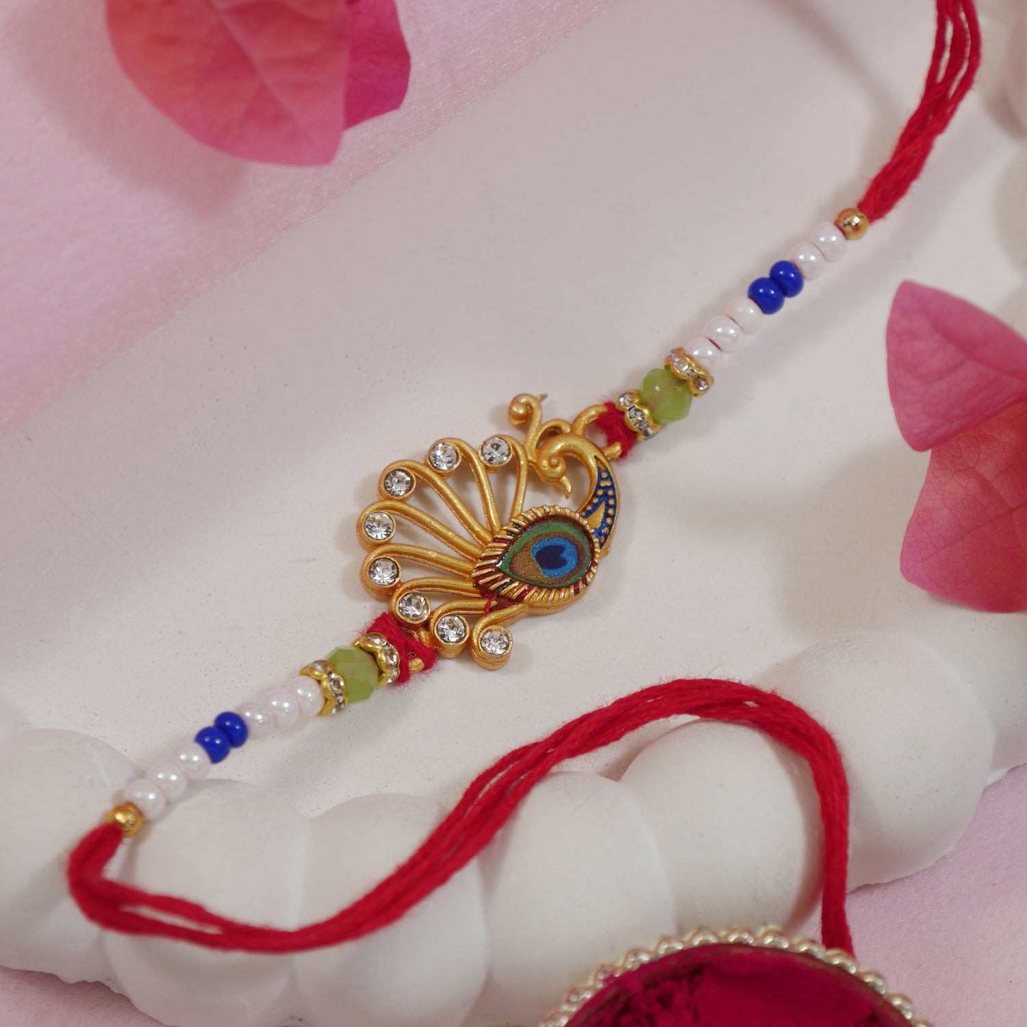 DELICATE PEARL BEADED RAKHI WITH ROLI CHAWAL & RAKSHABANDHAN CARD