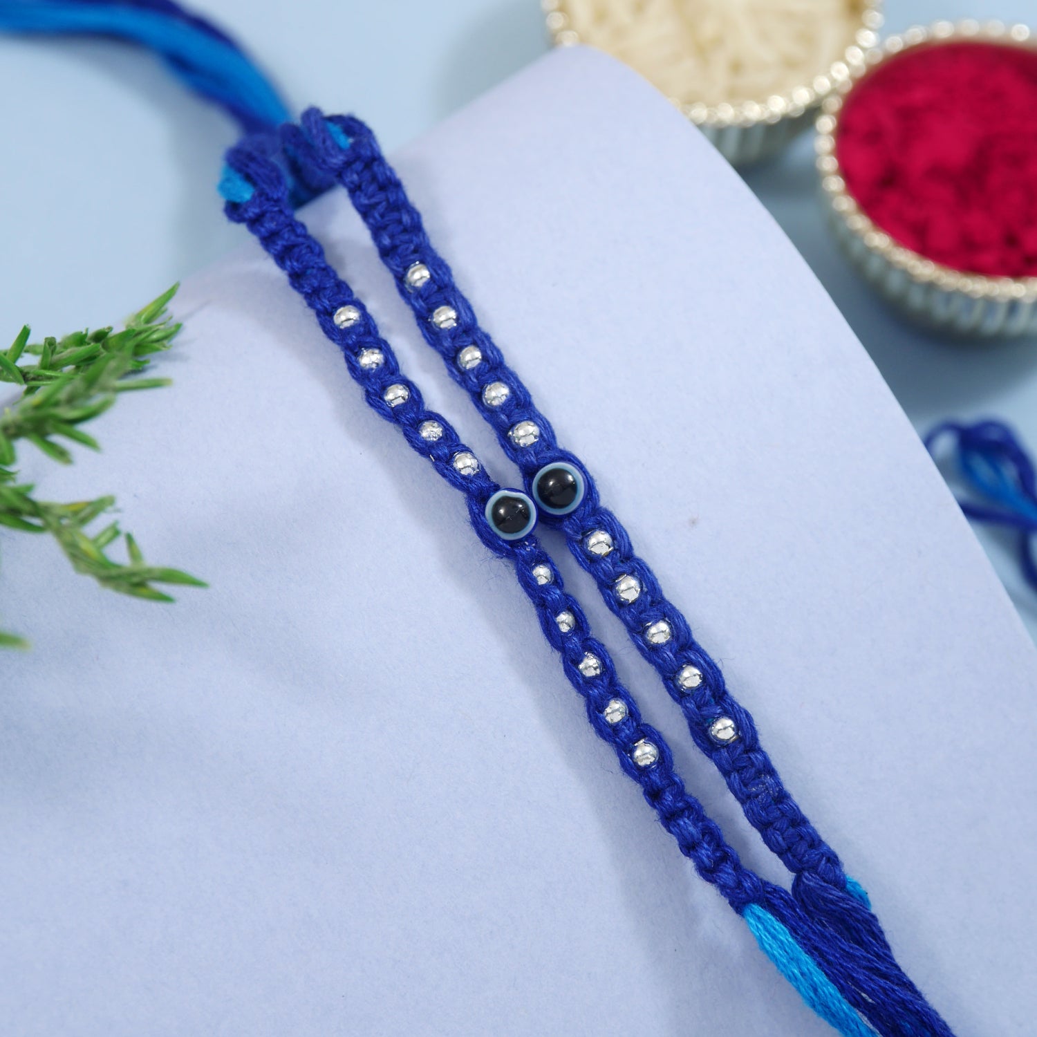 Evil Eye Rakhi Set with Roli Chawal & Rakshabandhan Card (Pack of 2)