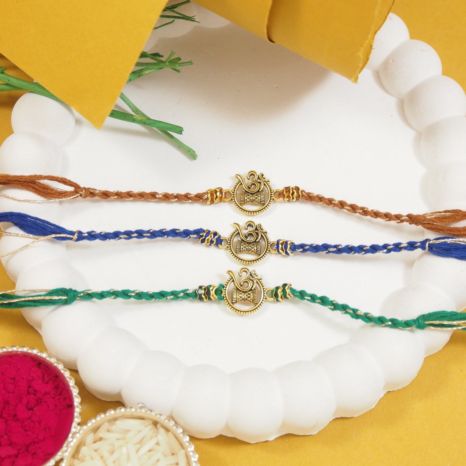 Traditional OM Rakhi with Roli Chawal & Rakshabandhan Card (Pack of 3)