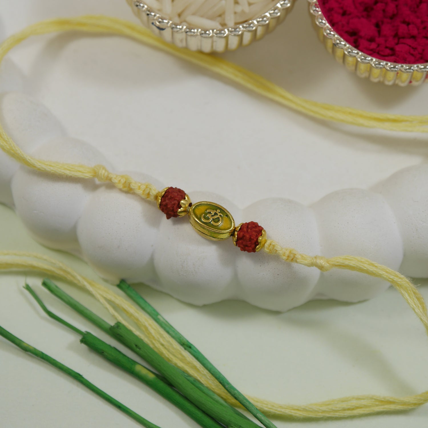 Om Enamel Yellow Rakhi with Roli Chawal & Raksha Bandhan Card
