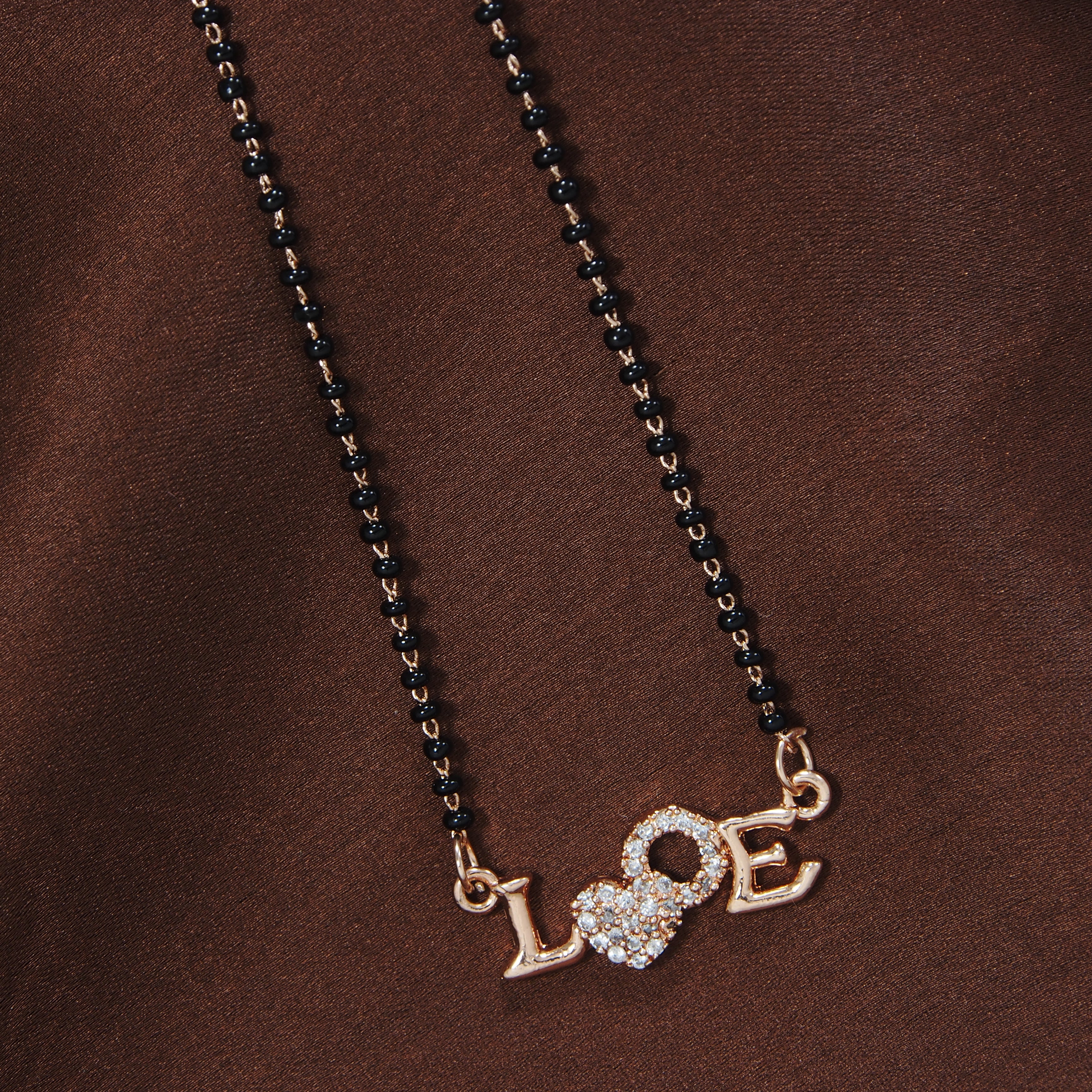 American diamond , rose gold mangalsutra