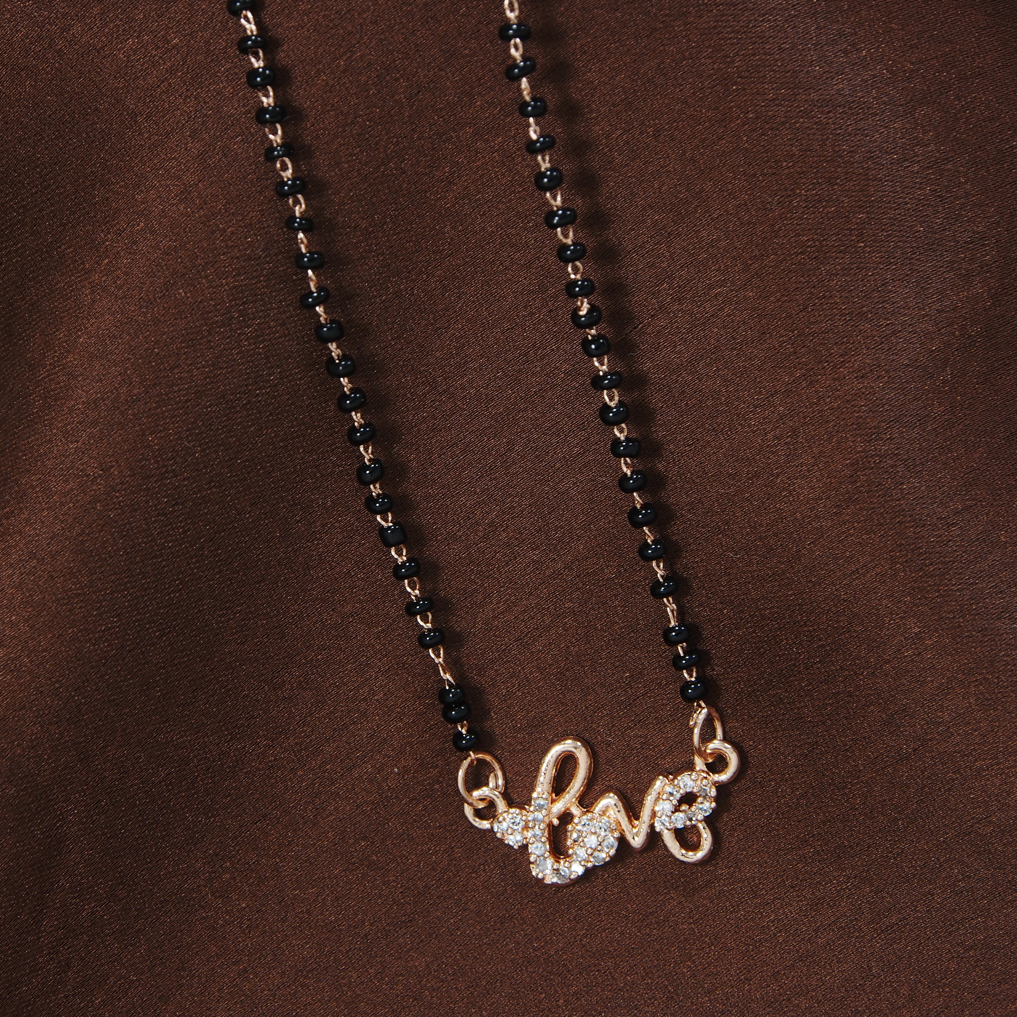 American diamond , rose gold mangalsutra