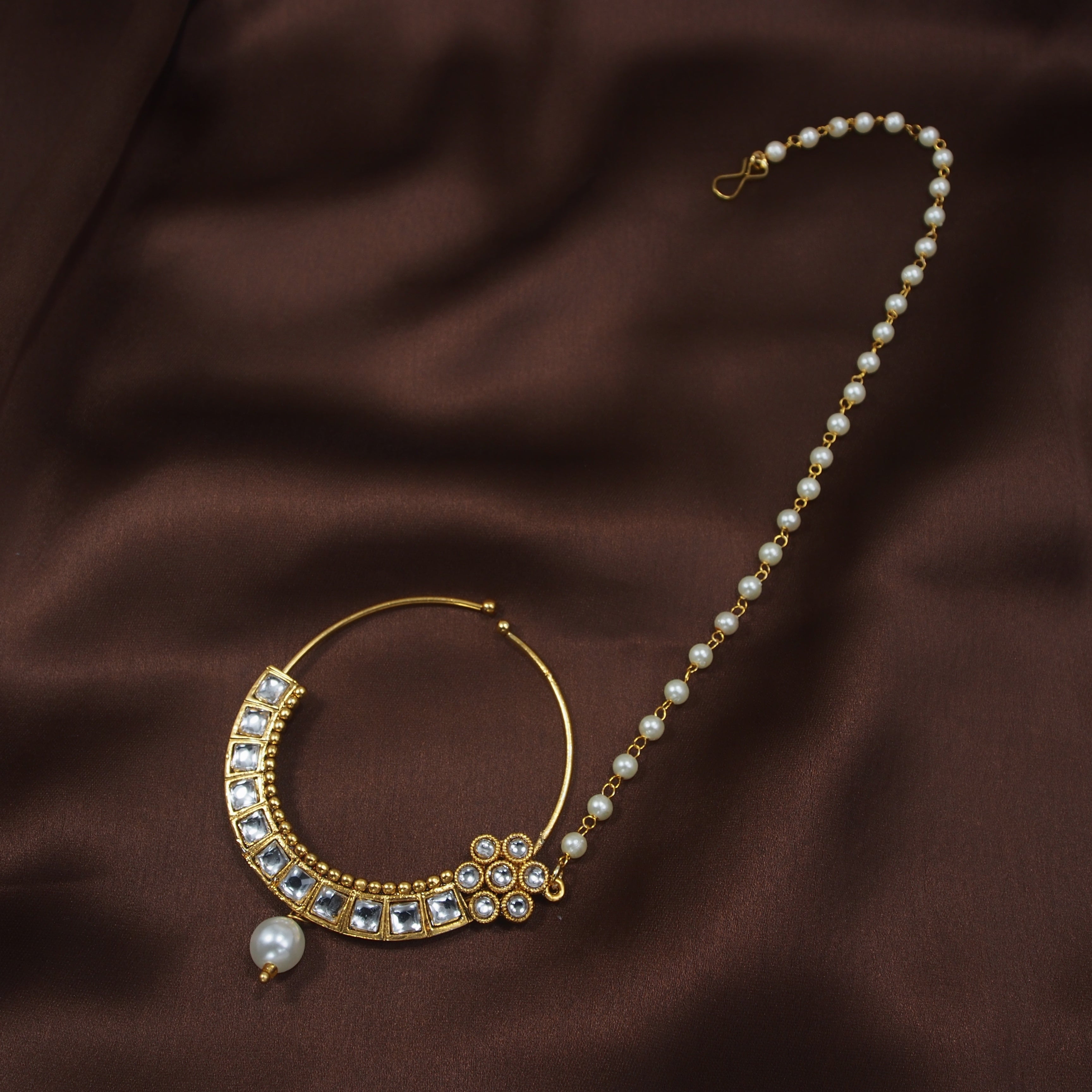 kundan , pearls , nose ring