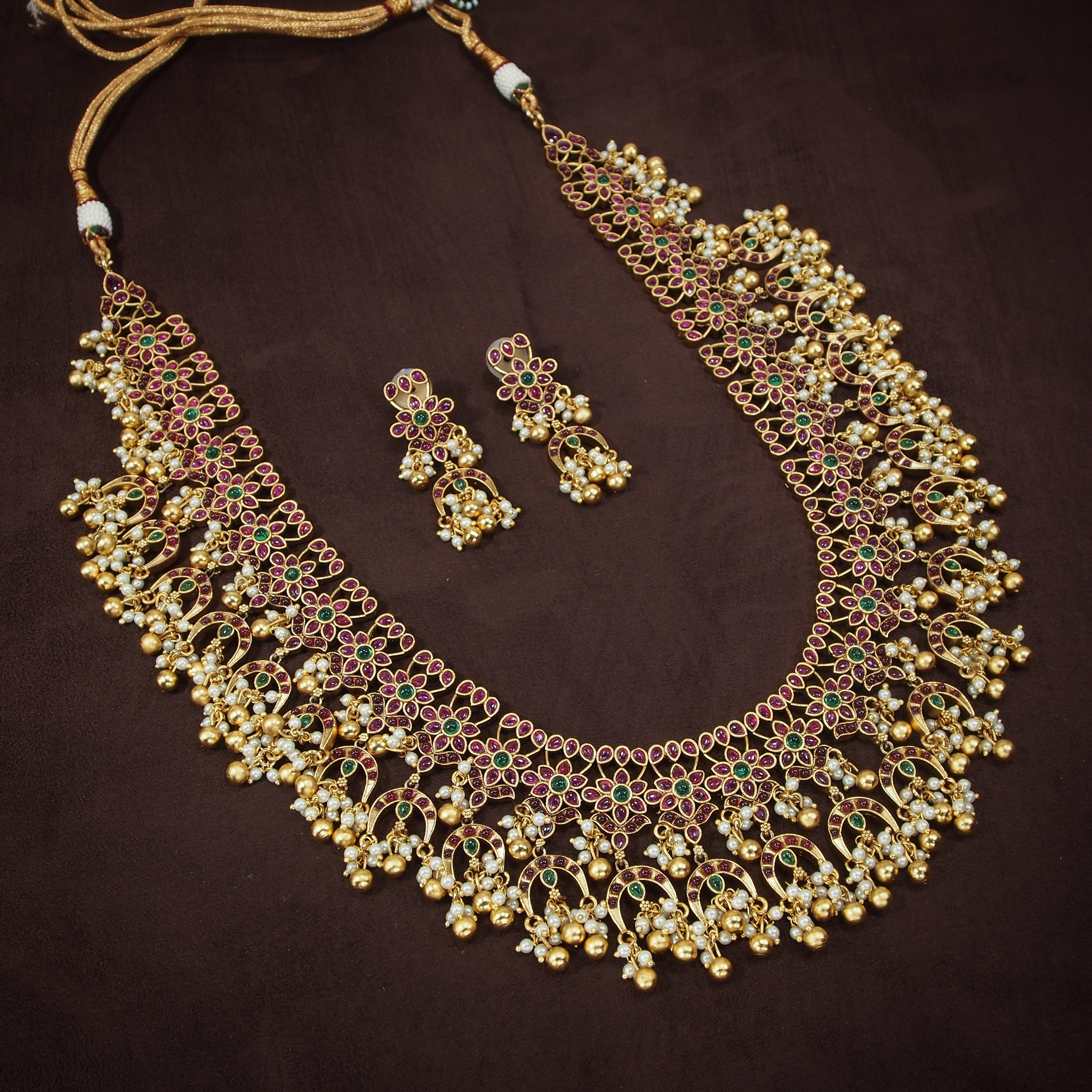 gold plated , kundan ,pearls , temple jewellery set