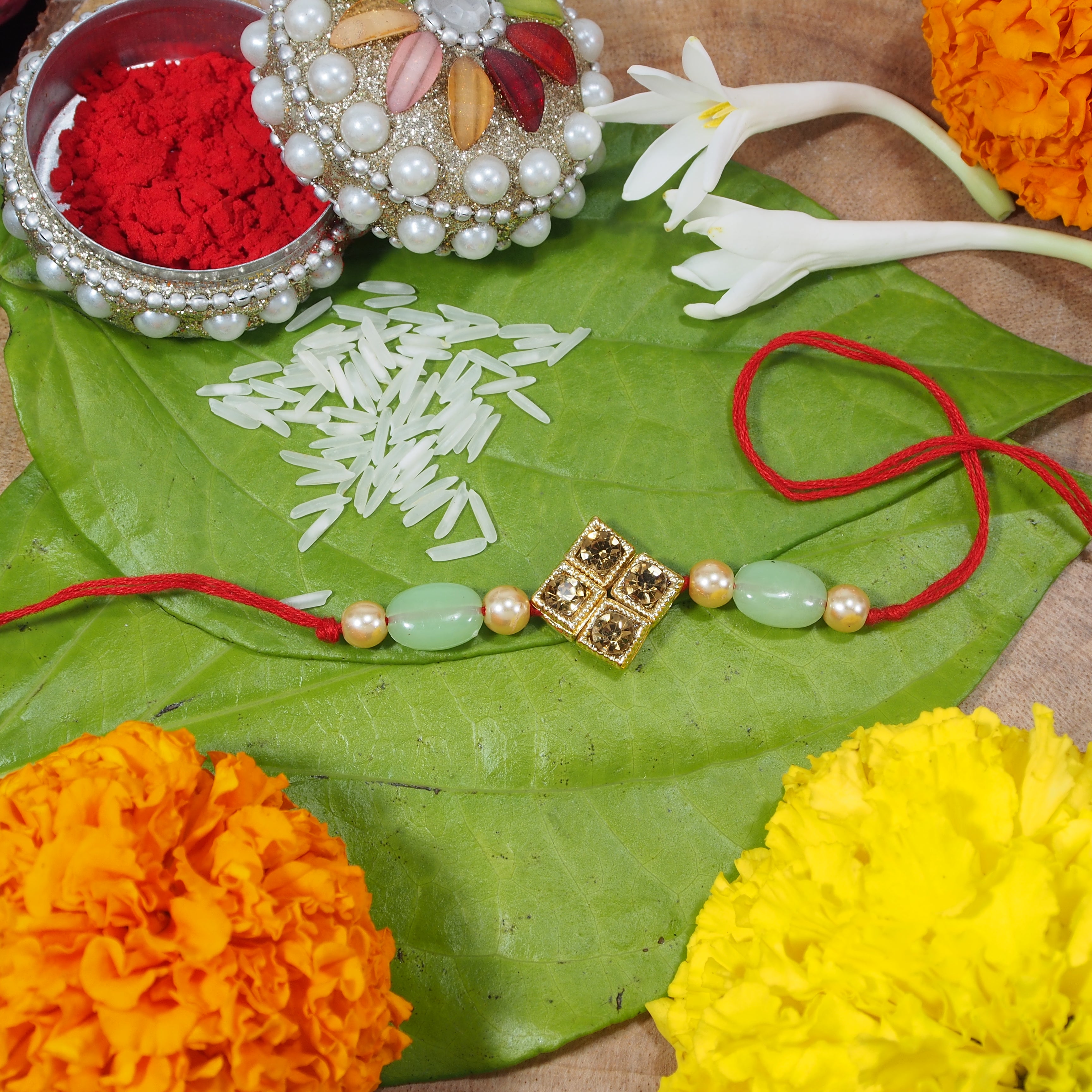 Gold Plated Designer Stone Studded Pearl Rakhi For Men/Boys (R859)