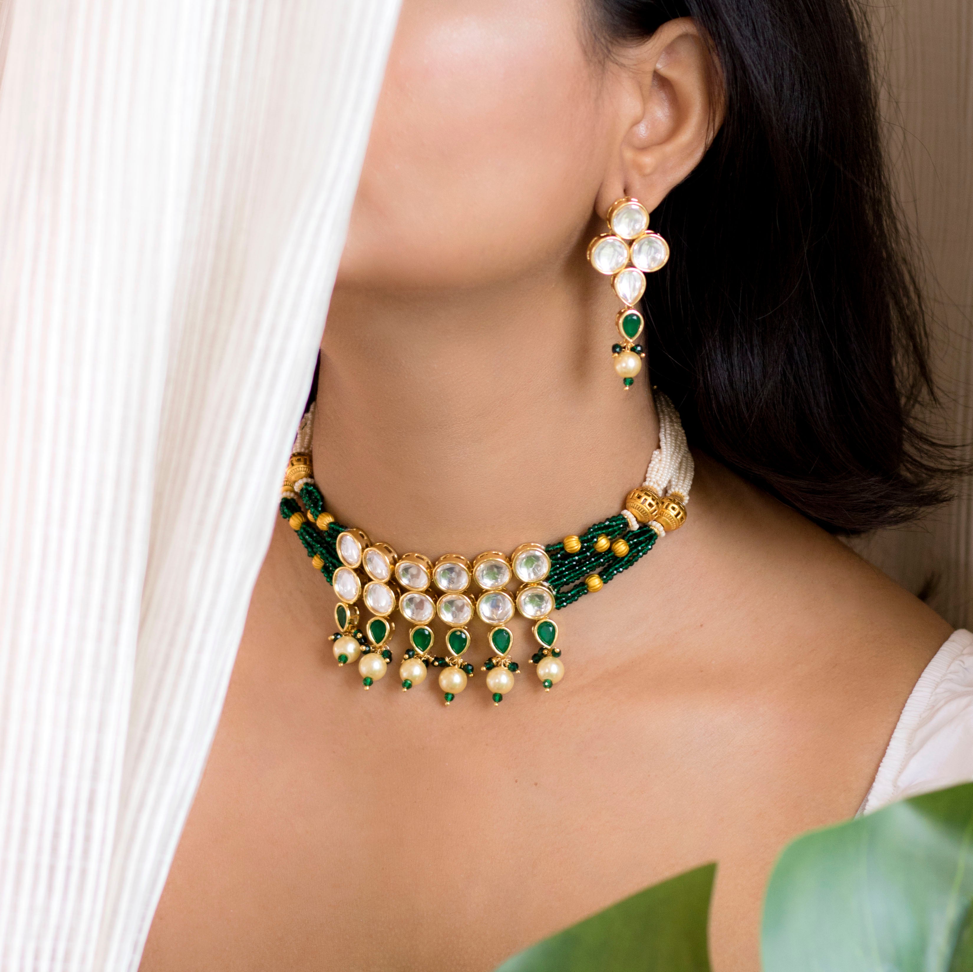 kundan , stones , pearls beded jewellery set