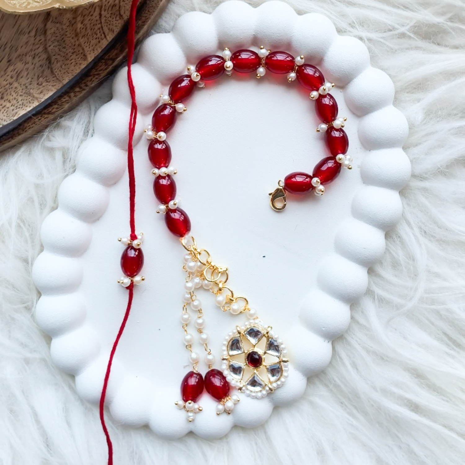 Maroon Kundan Pearl Bhaiya Bhabhi Rakhi With Roli Chawal & Rakshabandhan Card
