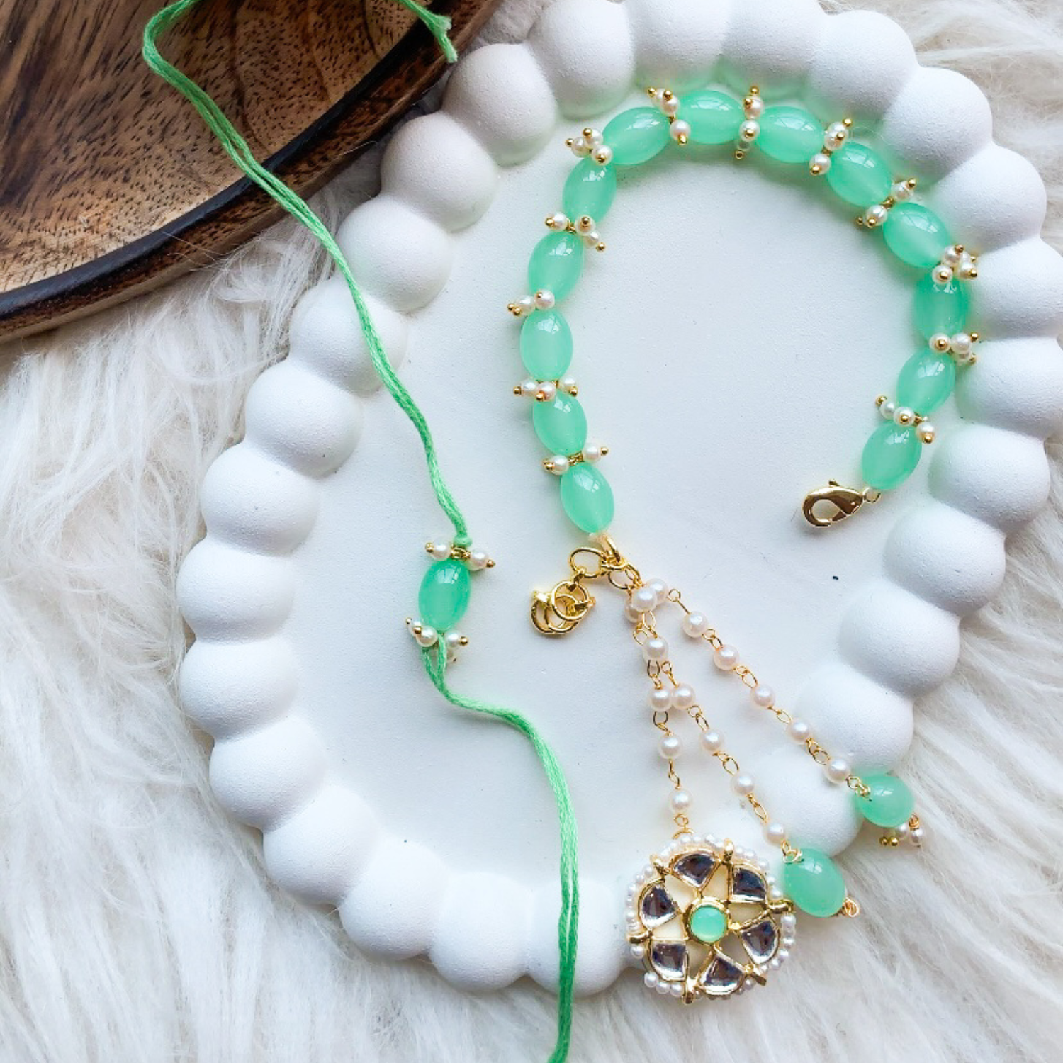 Mint Green Kundan Pearl Bhaiya Bhabhi Rakhi With Roli Chawal & Rakshabandhan Card