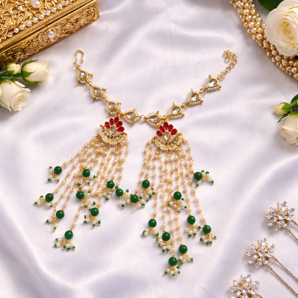 Jasleen- Kundan Pearl Tassel Statement Bracelet with Emerald Beads