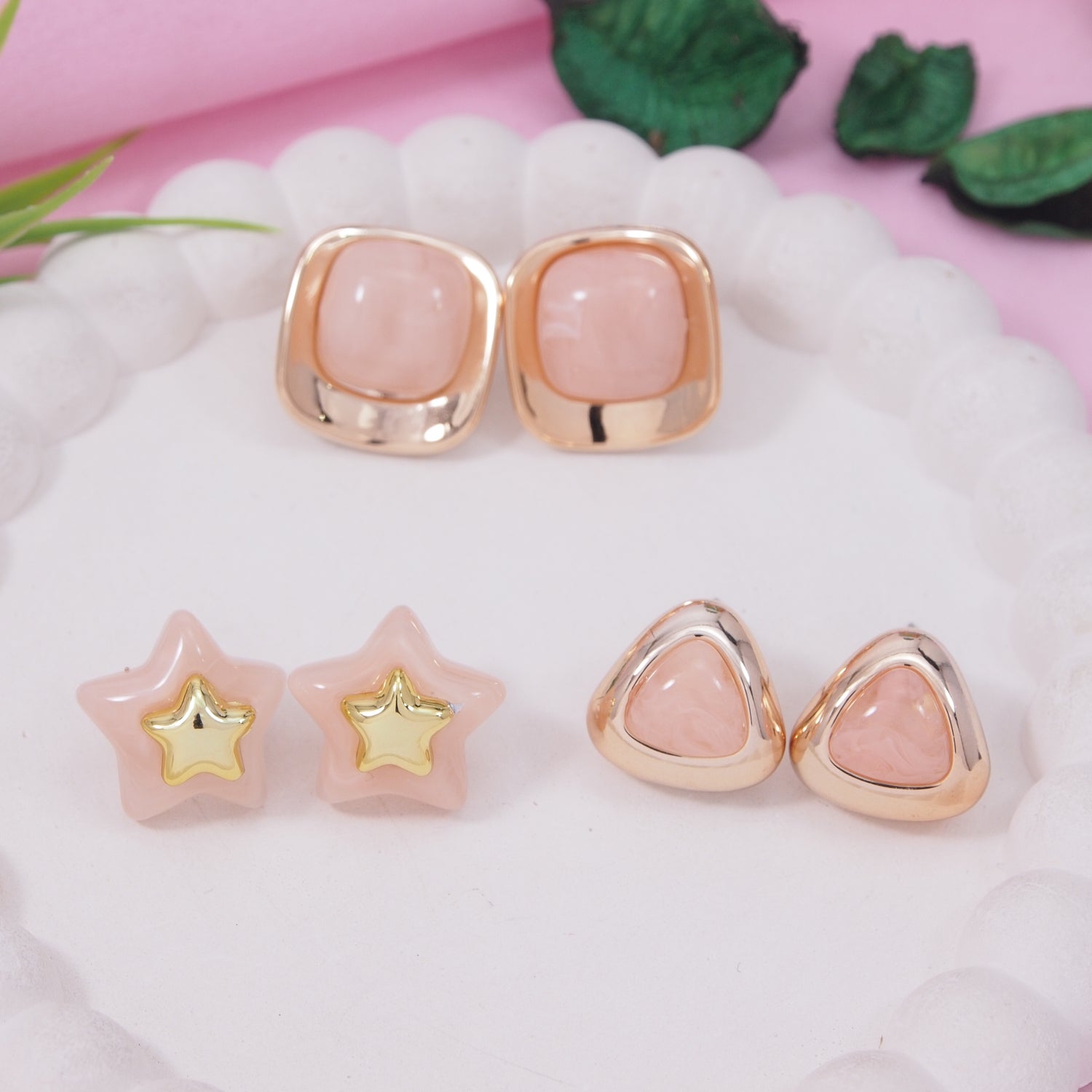 Peach Glow earring set with peach enamel triangle, star, and square-shaped gold-toned stud earrings