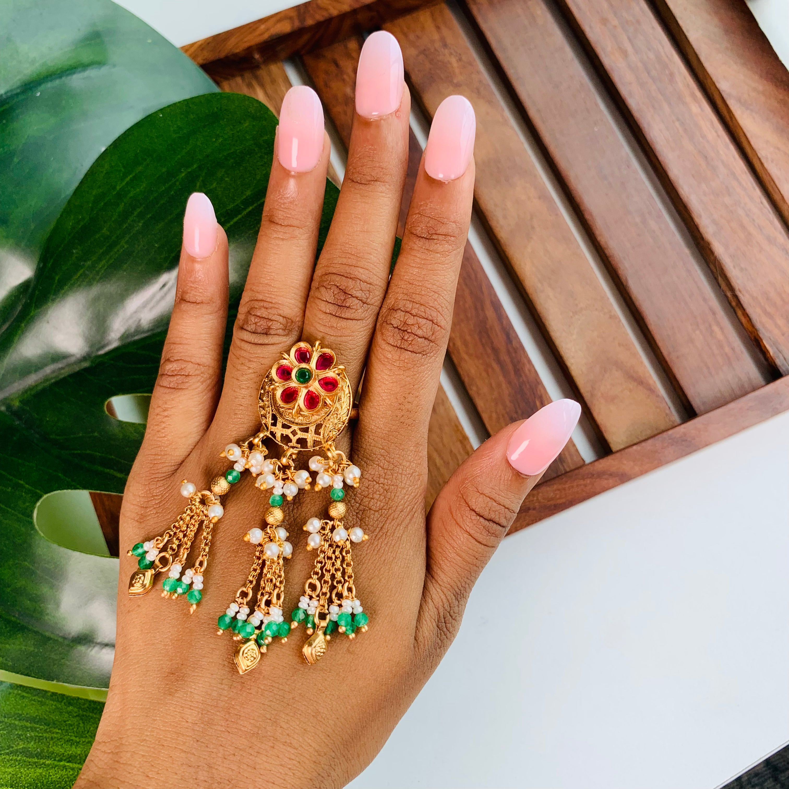 Antique gold floral ring with colorful stones and pearl danglers – statement ethnic ring for sangeet, festive functions, and traditional looks.