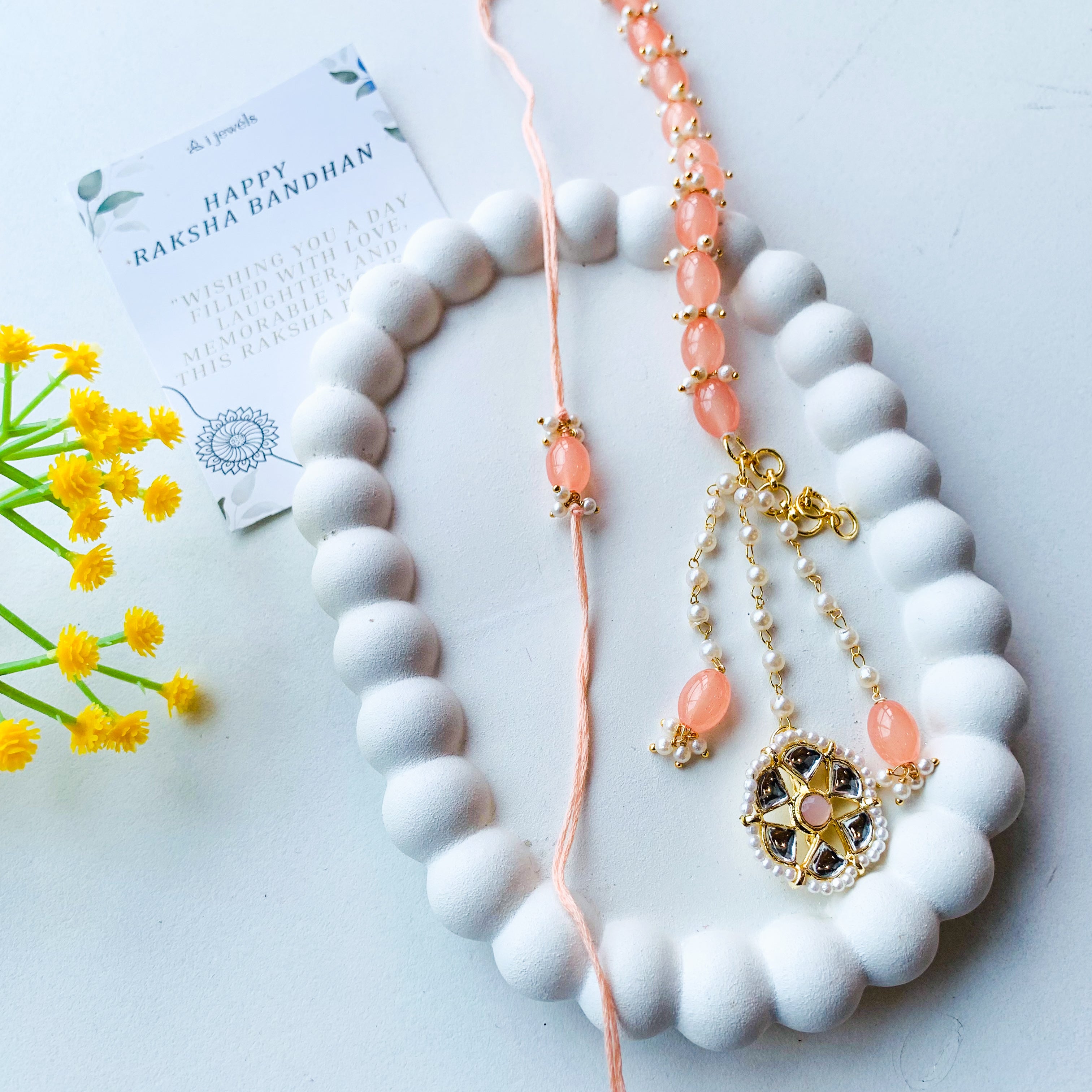 Peach Kundan Pearl Bhaiya Bhabhi Rakhi With Roli Chawal & Rakshabandhan Card
