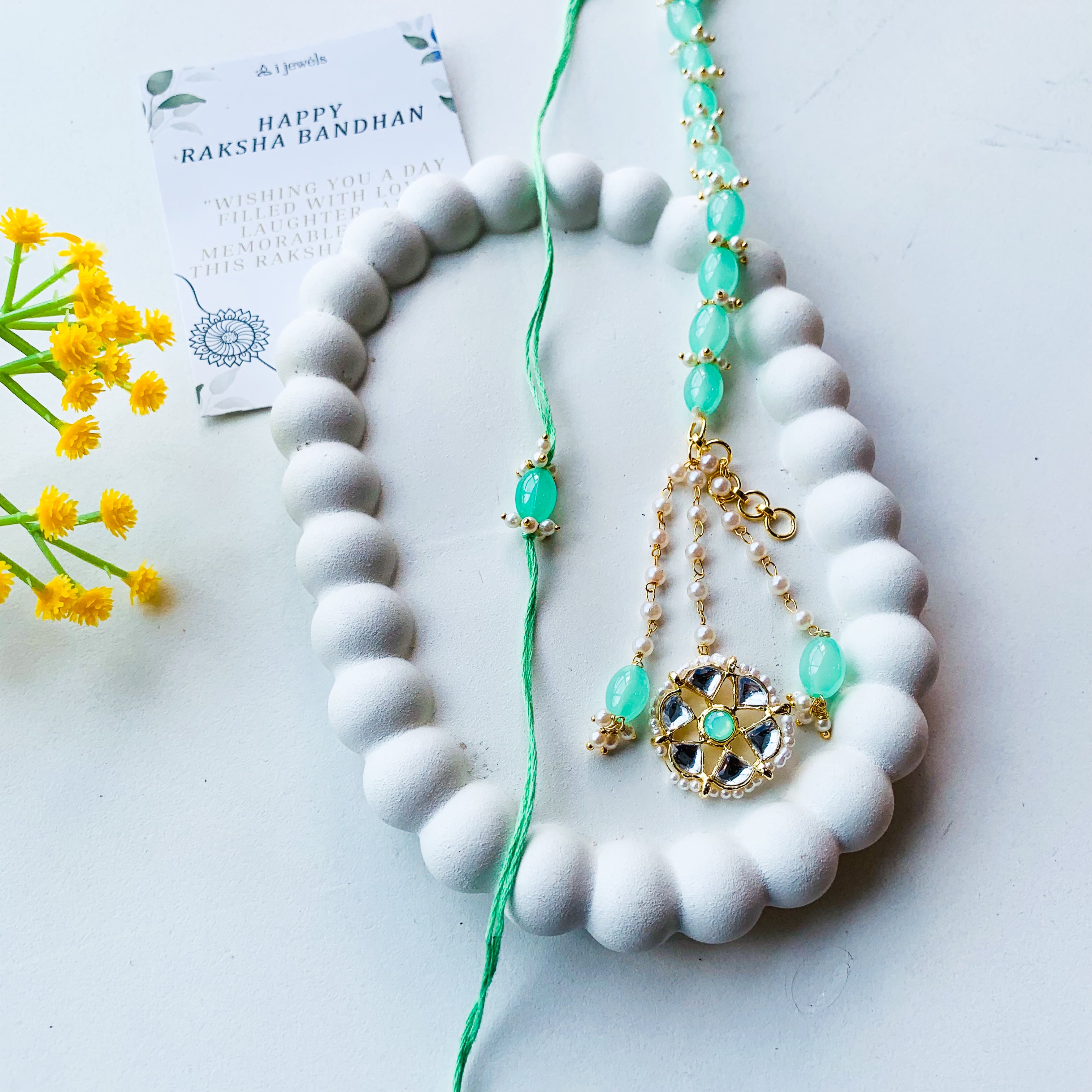 Mint Green Kundan Pearl Bhaiya Bhabhi Rakhi With Roli Chawal & Rakshabandhan Card