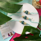 Beautiful Peacock Feather Rakhi with Roli Chawal & Card (Pack of 3)