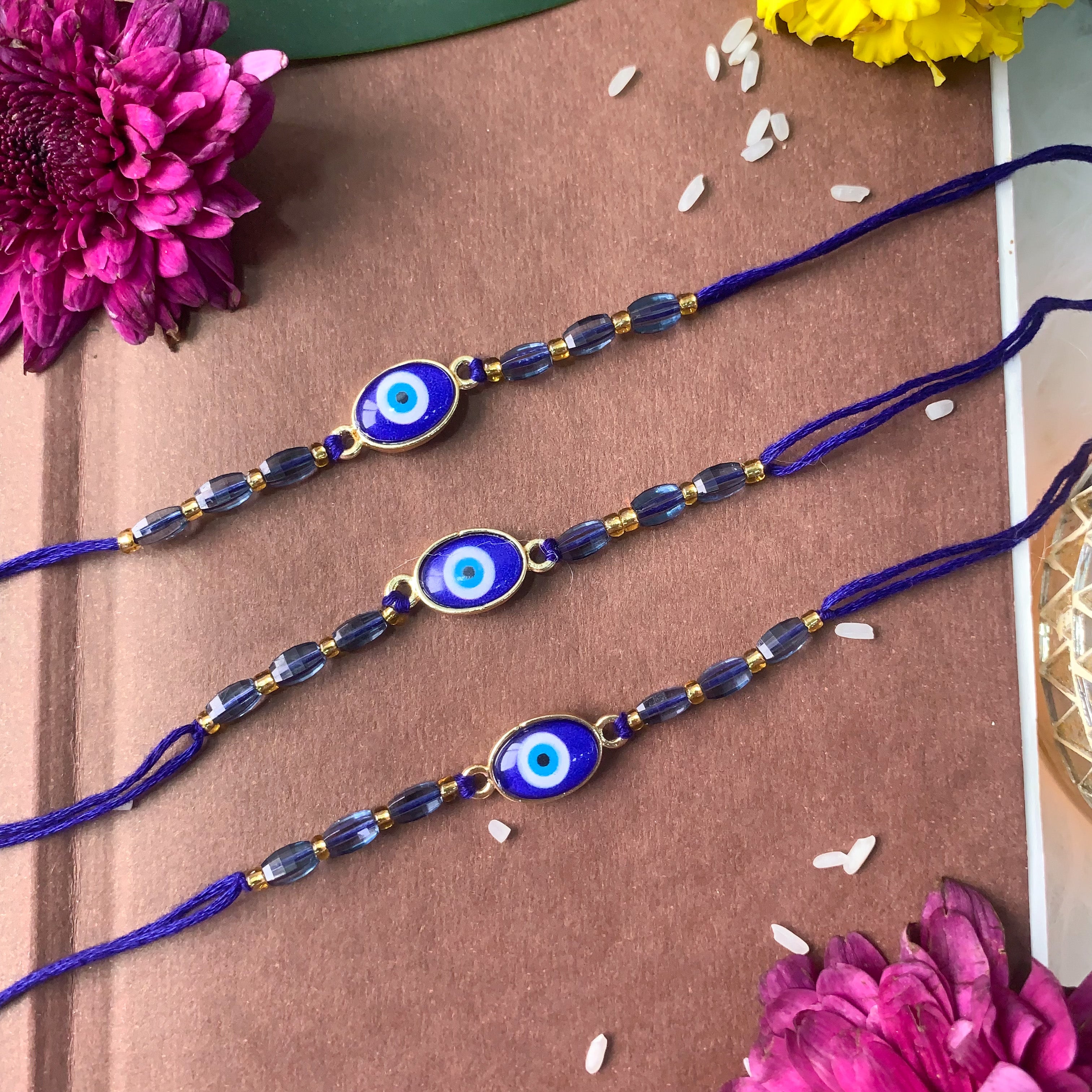 Evil Eye Shape Bhaiya Rakhi With Roli Chawal & Card (Pack of 3)