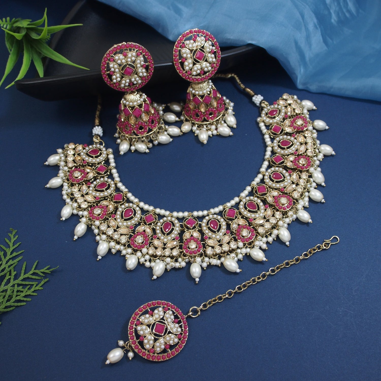Pink kundan choker necklace set with pearl drops and jhumka earrings