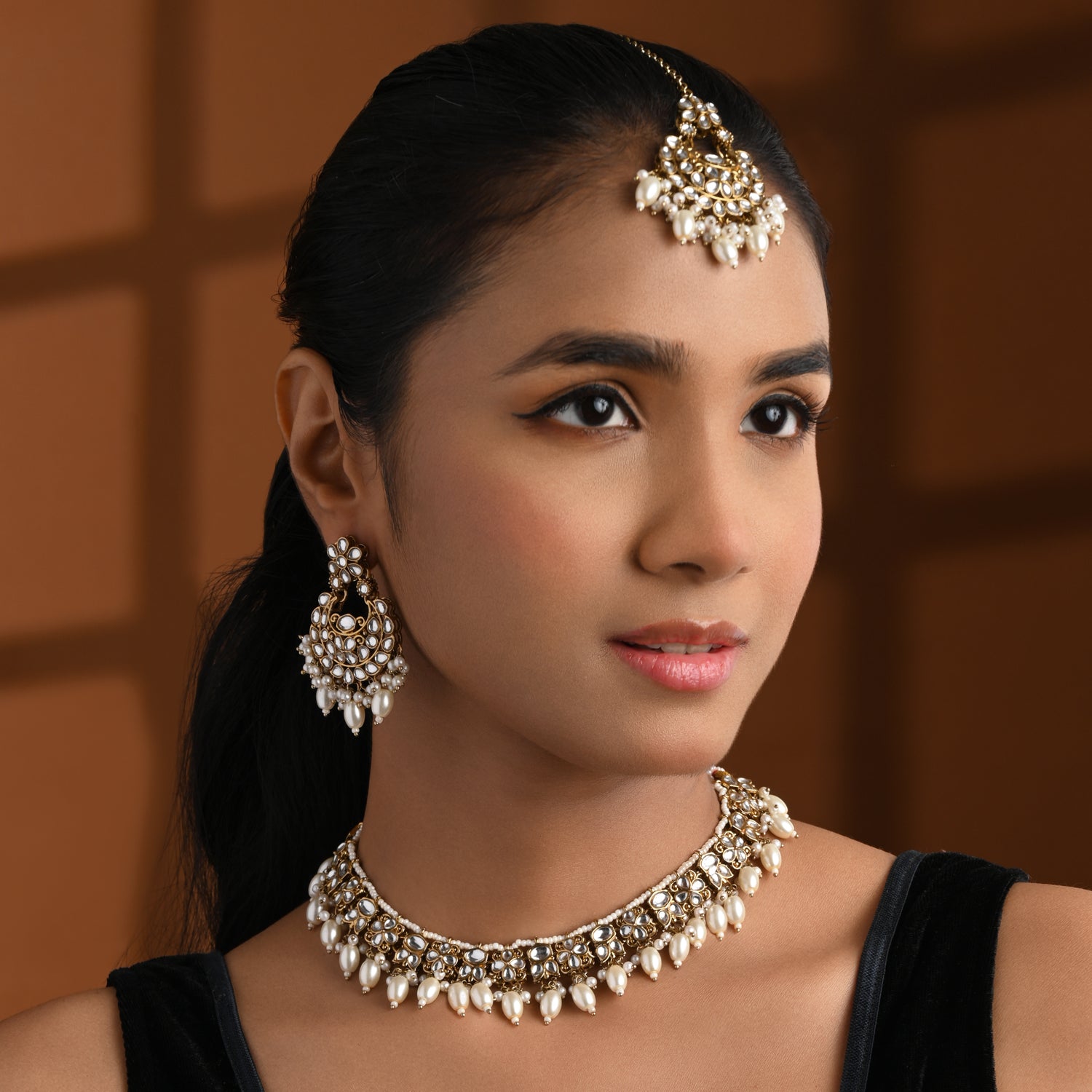 Nishika -  White Kundan Necklace Set