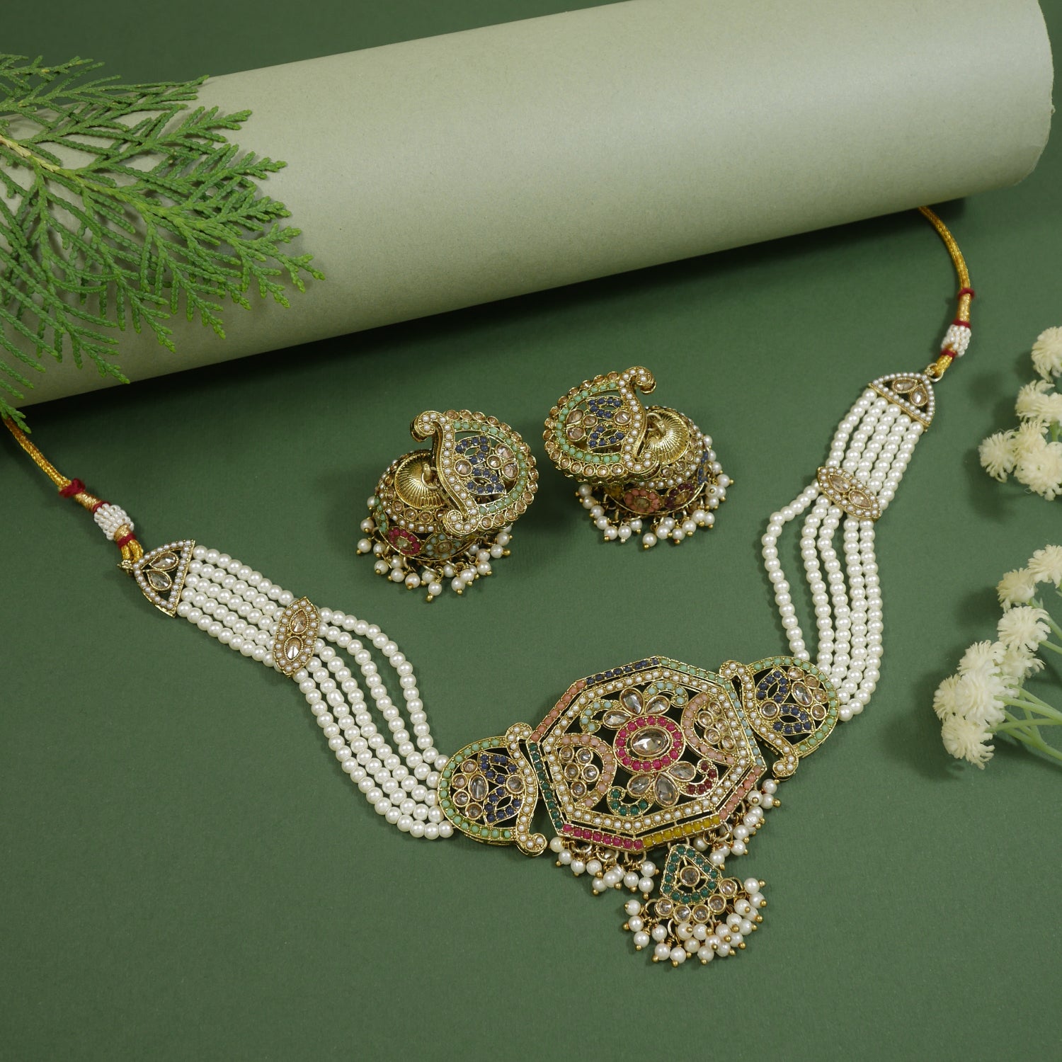 raditional kundan pearl necklace set with paisley-shaped jhumka earrings