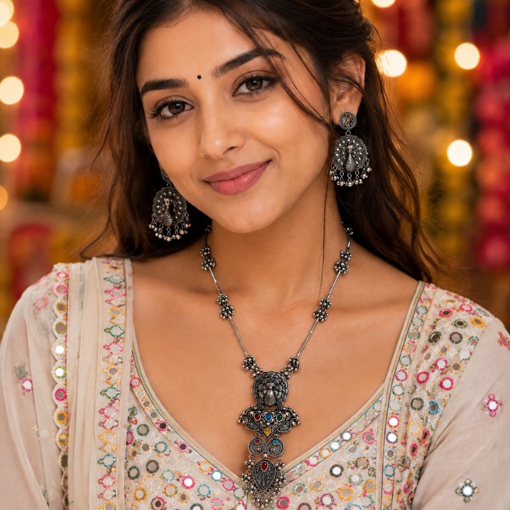 Dhanvika - Oxidised Silver Peacock Pendant Necklace Set