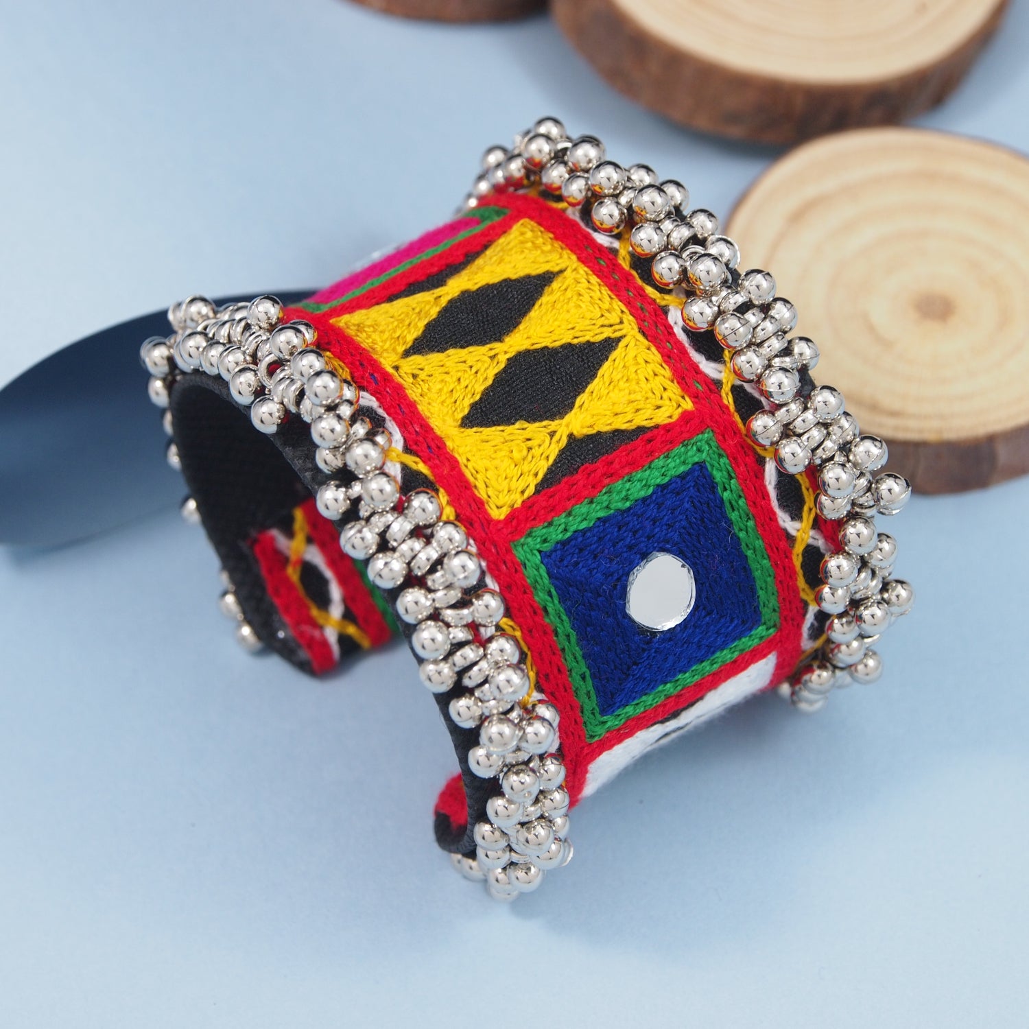 Colorful geometric-patterned kada with beads for Navratri 