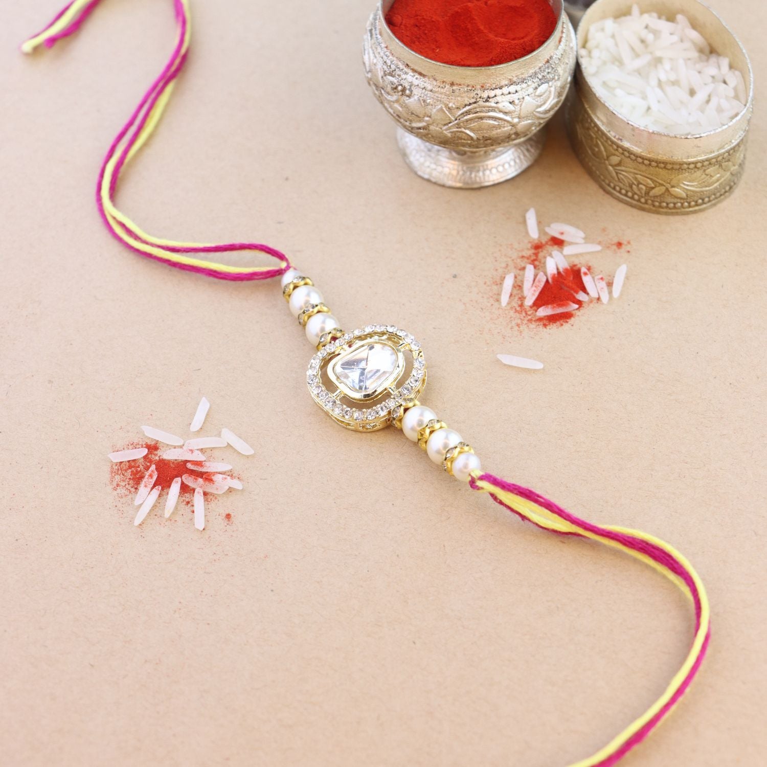 Dazzling Pearl Kundan Stone Rakhi with Roli Chawal & Card