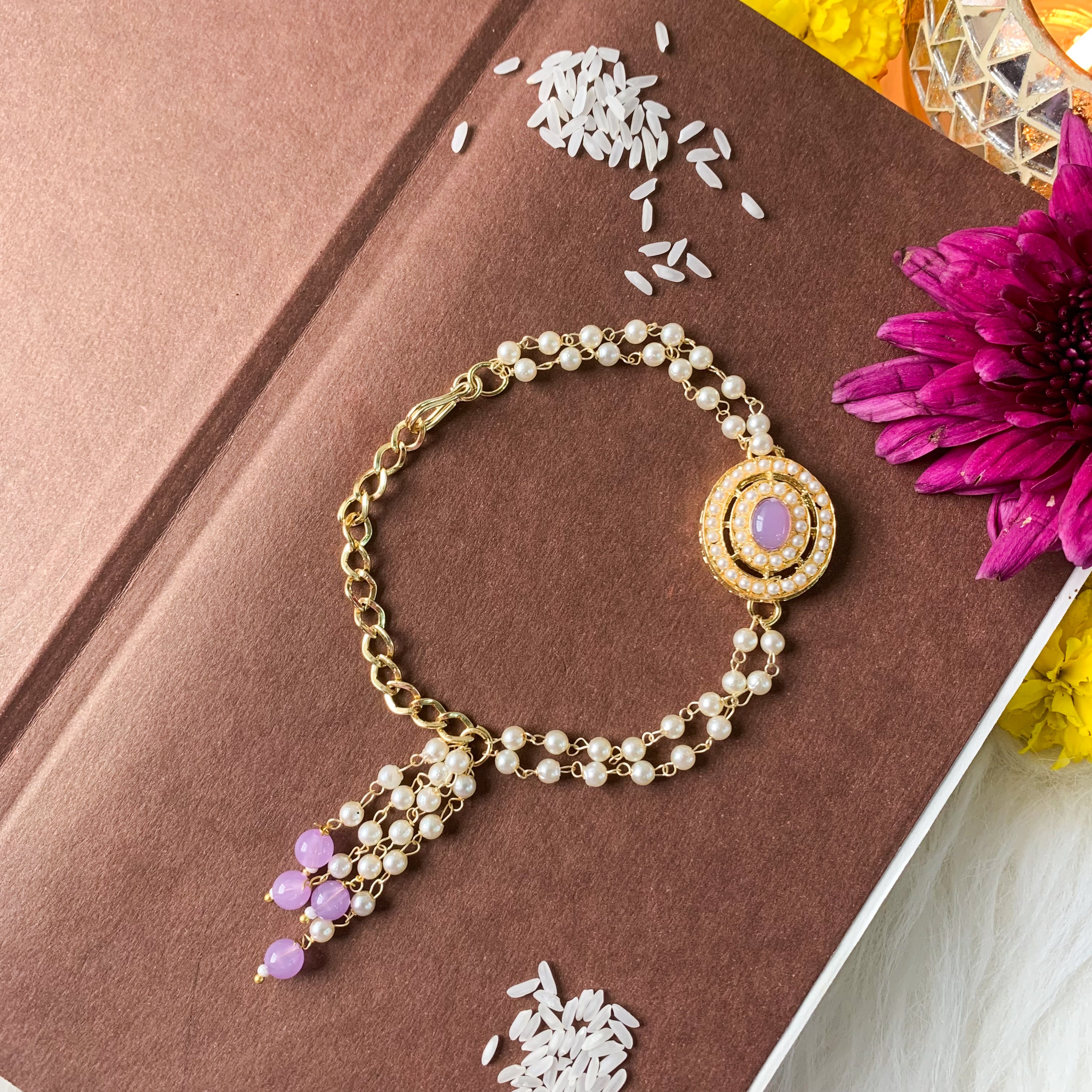 Alluring Pearl & Kundan Lumba Rakhi