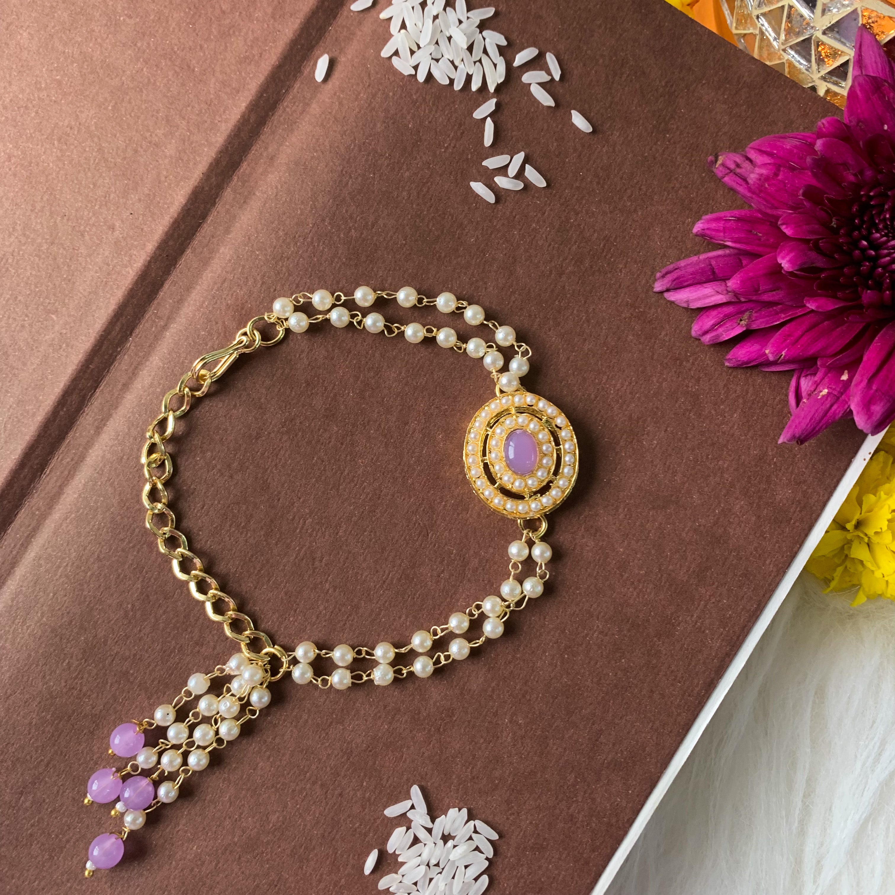 Alluring Pearl & Kundan Lumba Rakhi